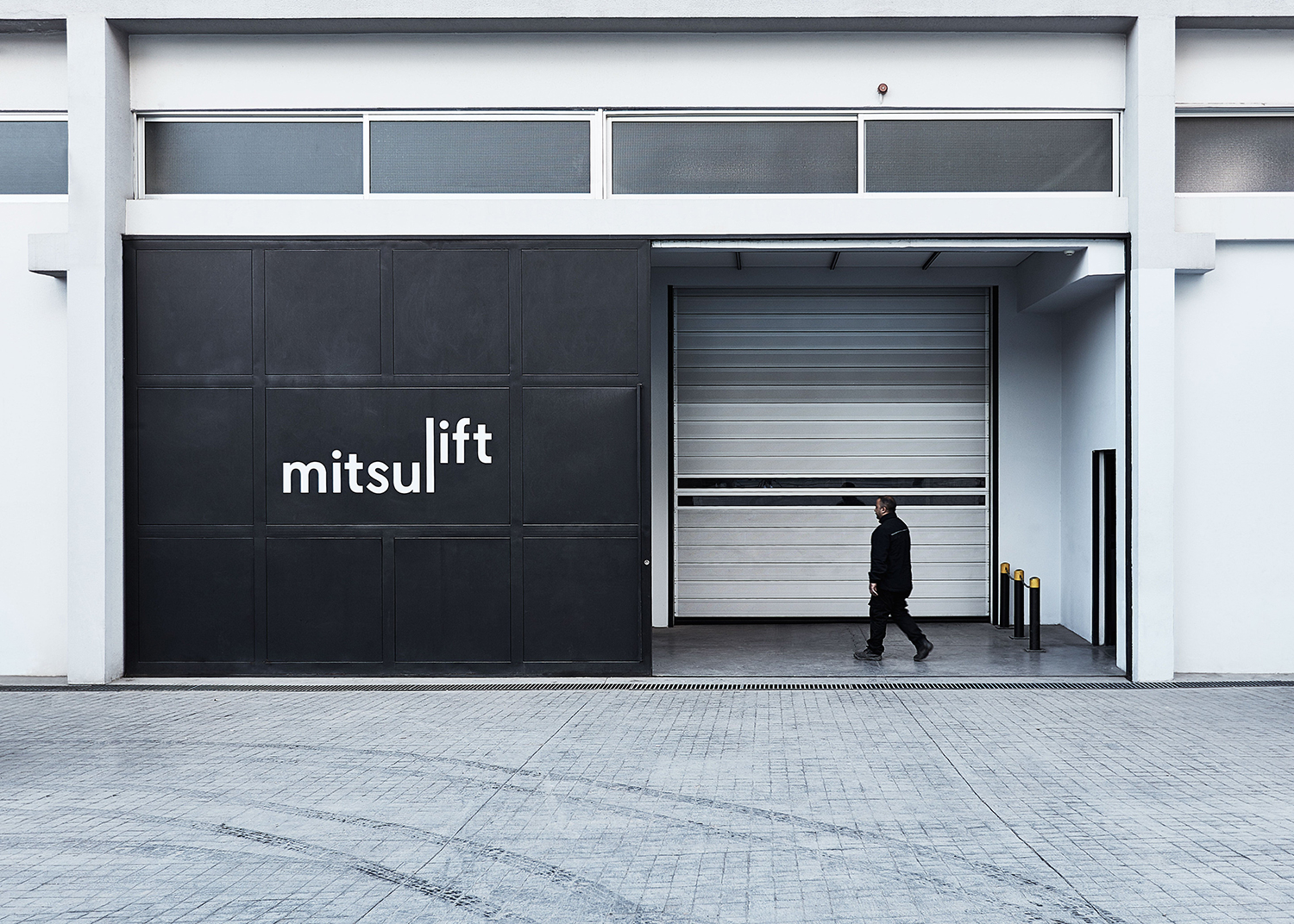 Wordmark and signage by Base Design for elevator specialist Mitsulift