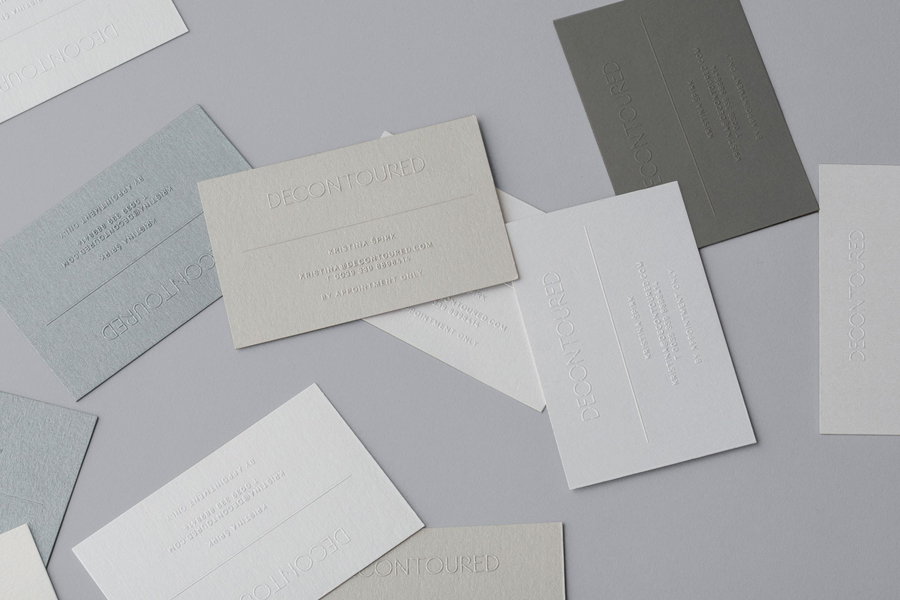 Blind embossed business cards designed by Bunch for Milan based fashion label Decontoured