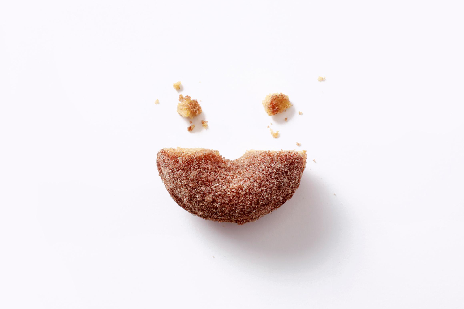 Logo, print and packaging by Sydney-based graphic design studio Garbett for donut bakery Happy Maple. 