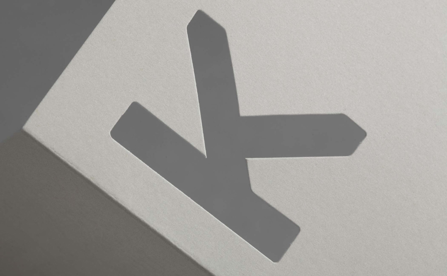 Die cut logo by Norwegian graphic design studio Bielke&Yang for engineering consultancy K Apeland
