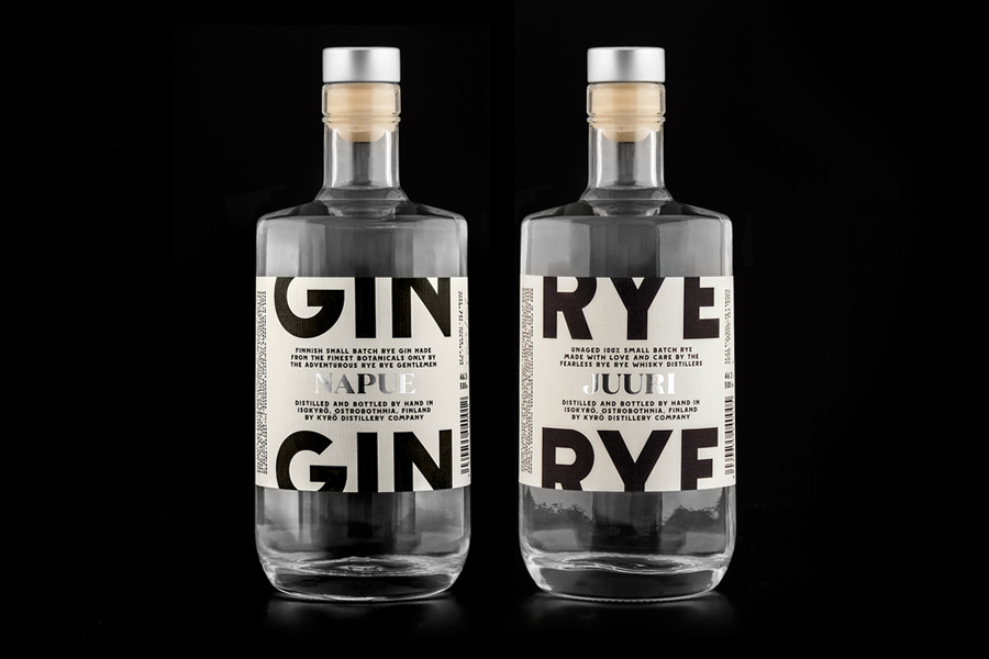 Packaging with laid paper and silver foil detail designed by Werklig for Kyrö Distillery Company