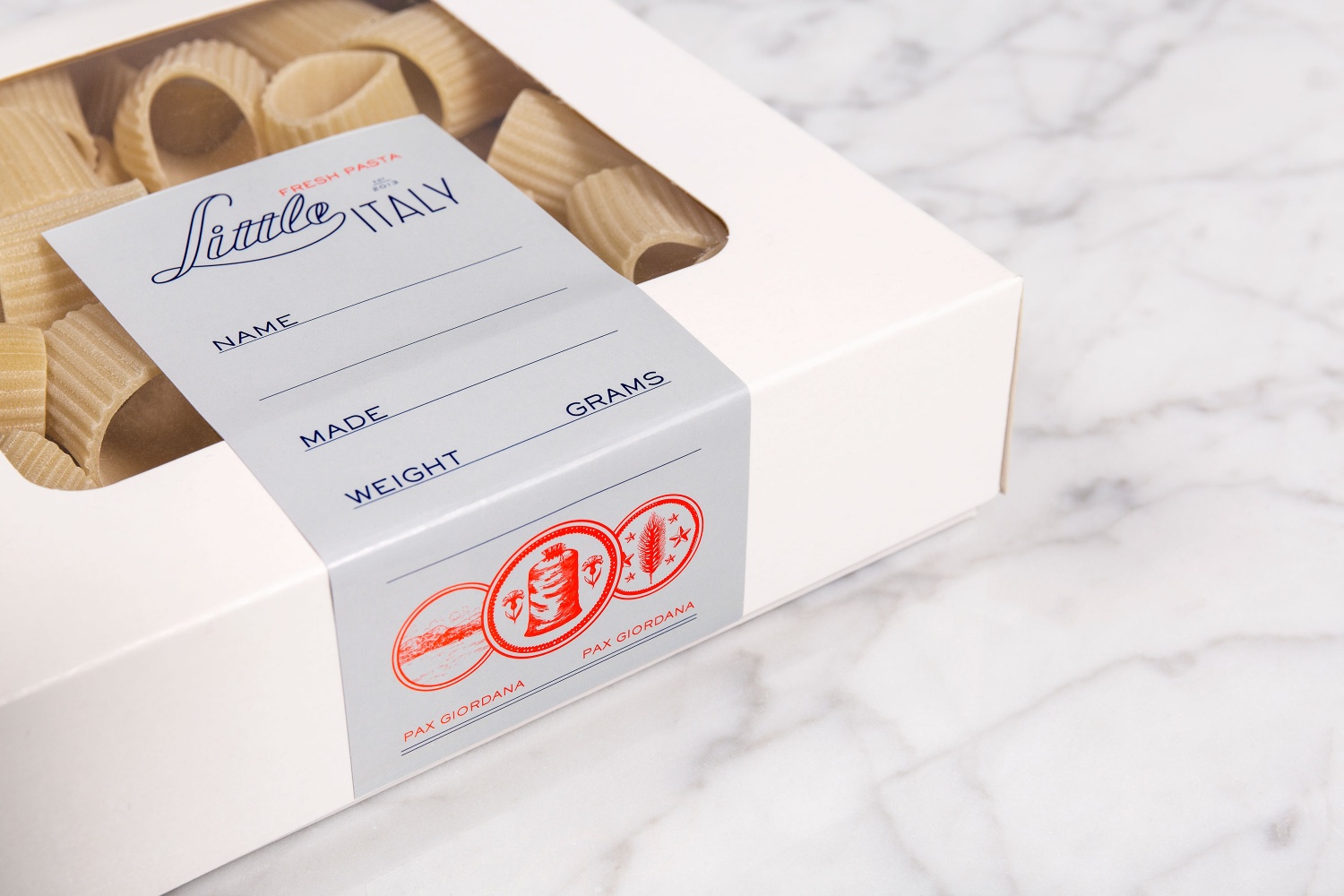 Branding and packaging by British studio Here Design for Amman-based restaurant Little Italy