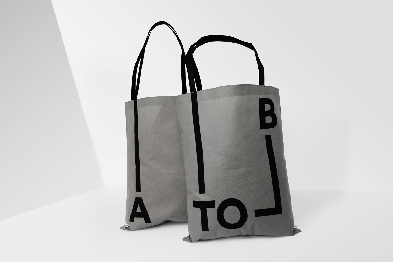 Brand identity and branded tote bags for Scandinavian retailer, bag and travel specialist A-TO-B by Stockholm Design Lab