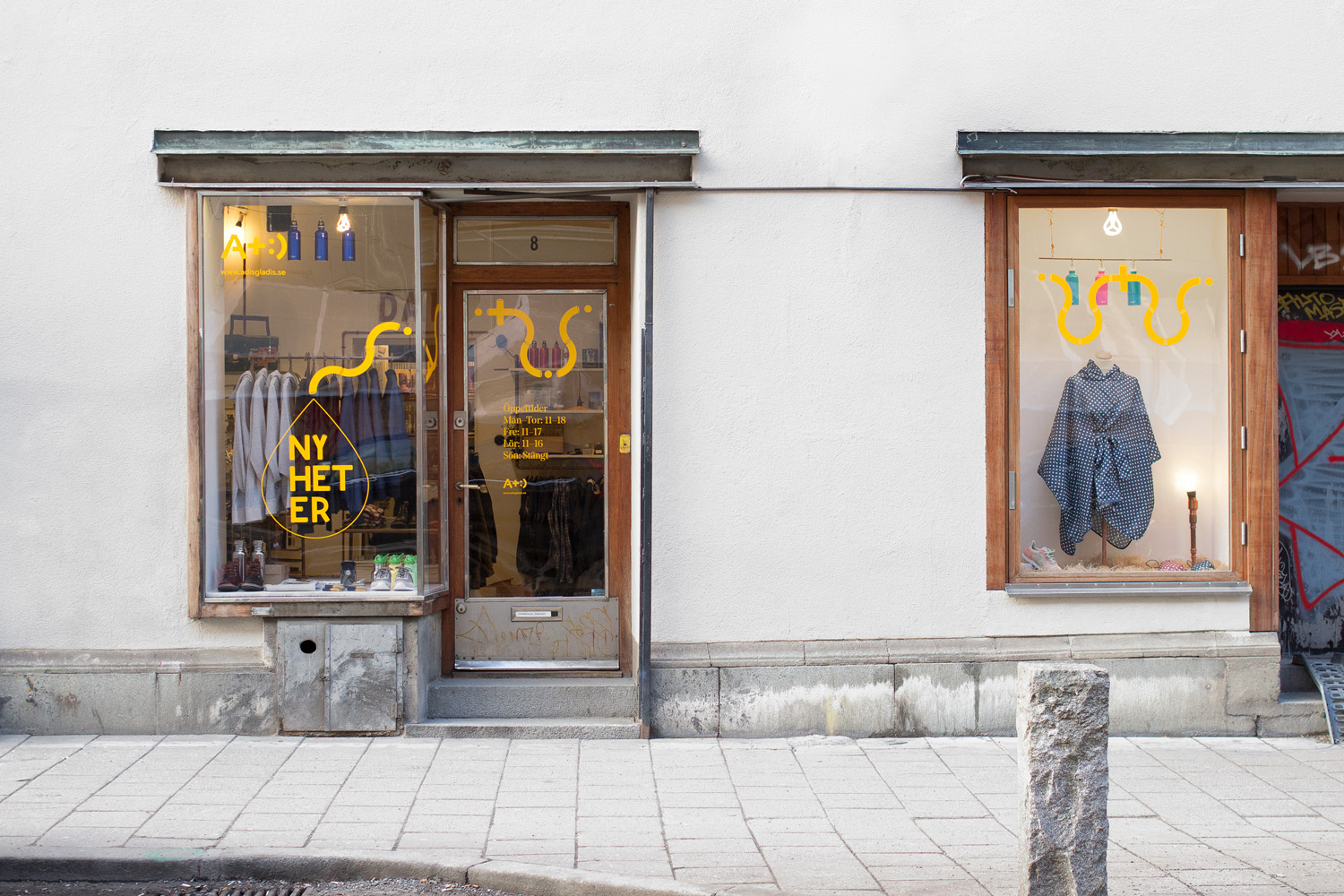 Signage designed by Bedow for Swedish clothing and gadget retailer Adisgladis