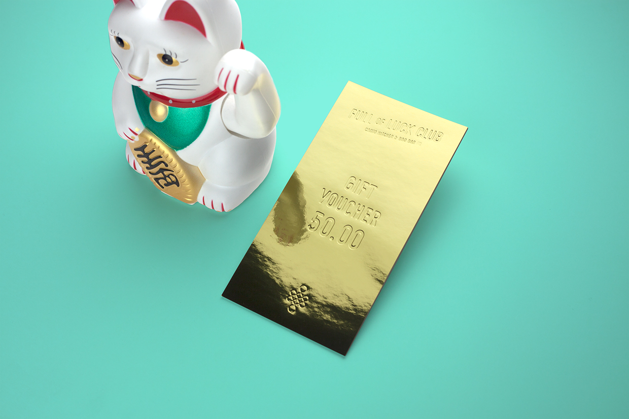 Embossed gold gift voucher by Bravo for modern Cantonese kitchen Full of Luck Club 福乐