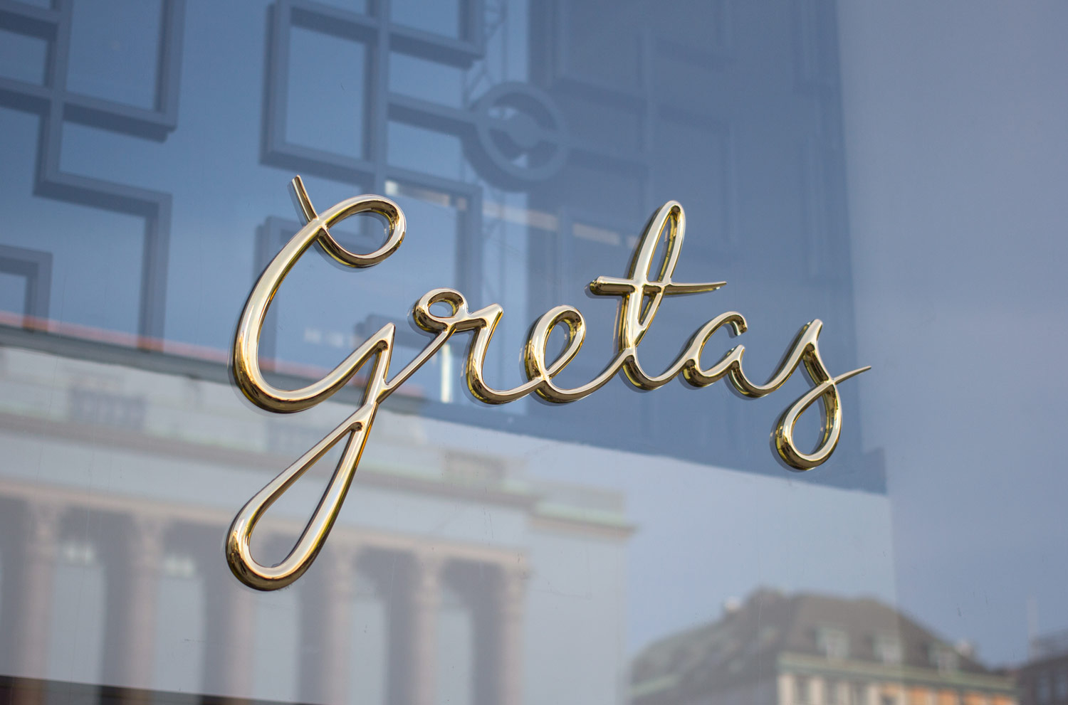 Logotype and signage for Stockholm-based cafe Gretas at Haymarket designed by 25AH, Sweden