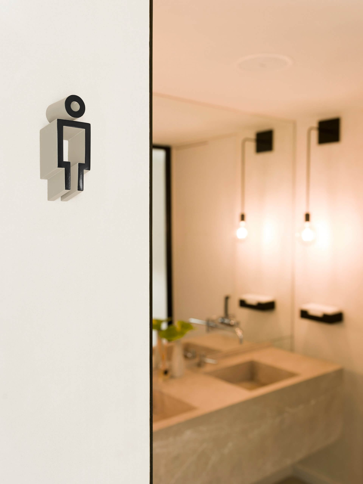 WC signage designed by Mucho for Spanish 5-star hotel Sant Francesc.