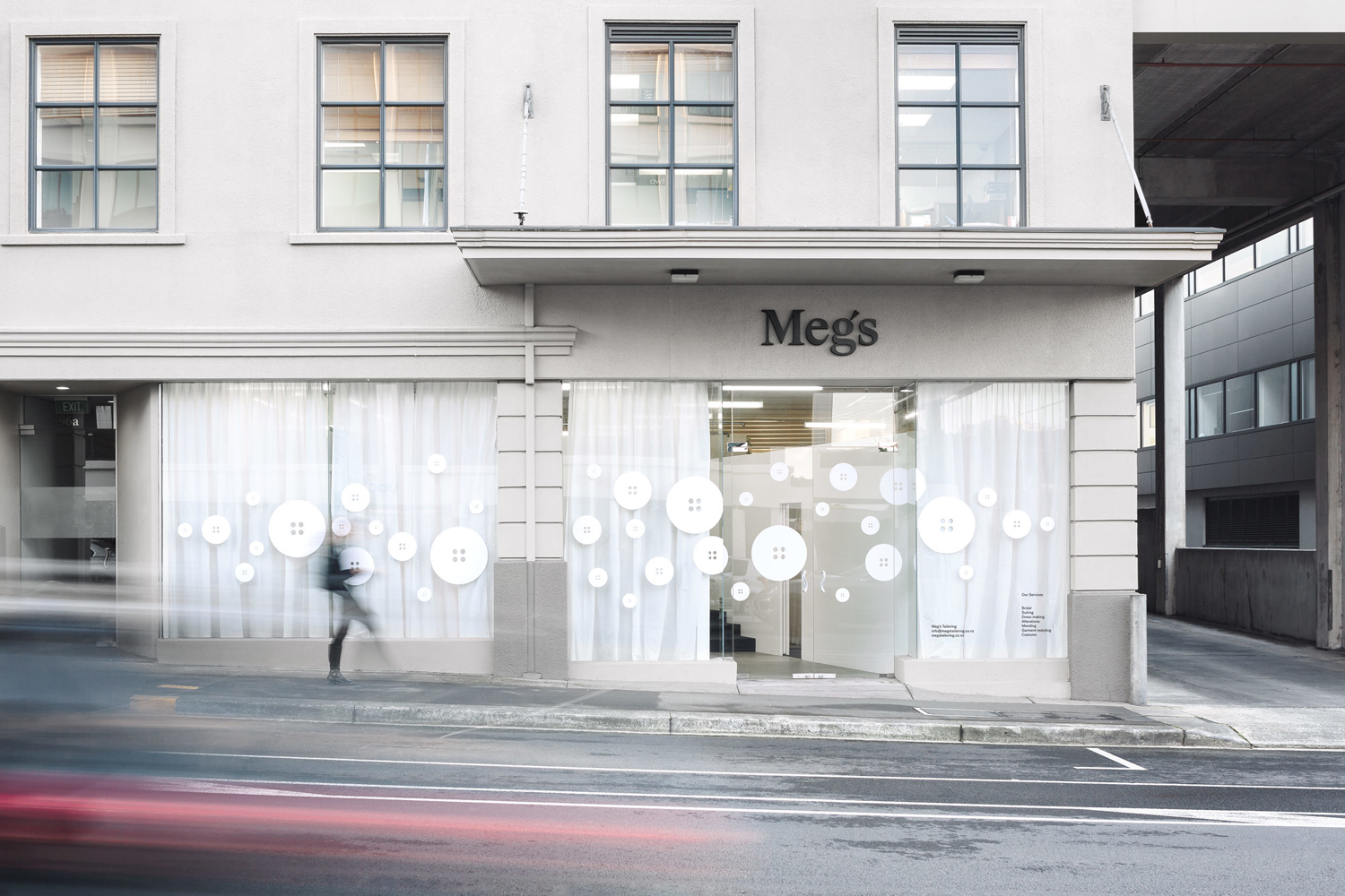 Brand identity and exterior decals and signage by Auckland-based Studio South for New Zealand tailoring service Meg's