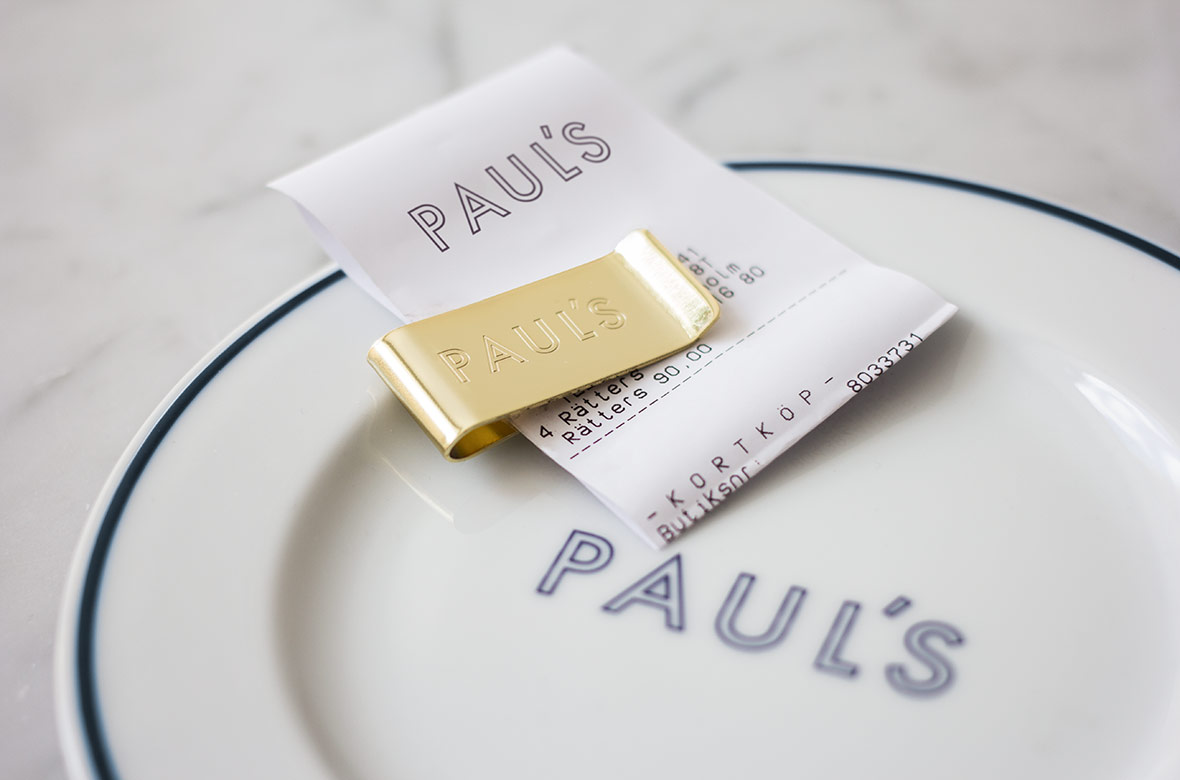 Branded bill clip for Stockholm-based restaurant Paul's at Haymarket by 25AH, Sweden