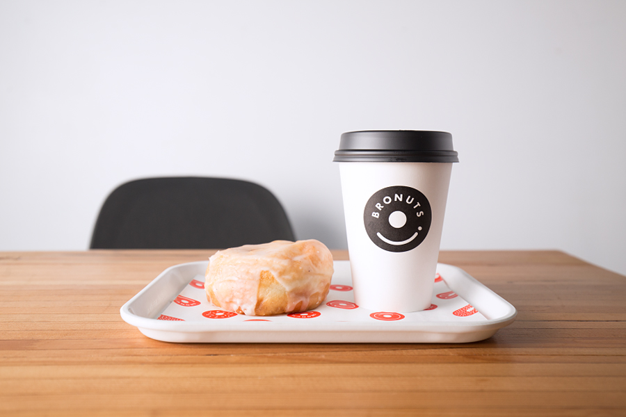 Branded coffee cup for Bronuts by Canadian graphic design studio One Plus One
