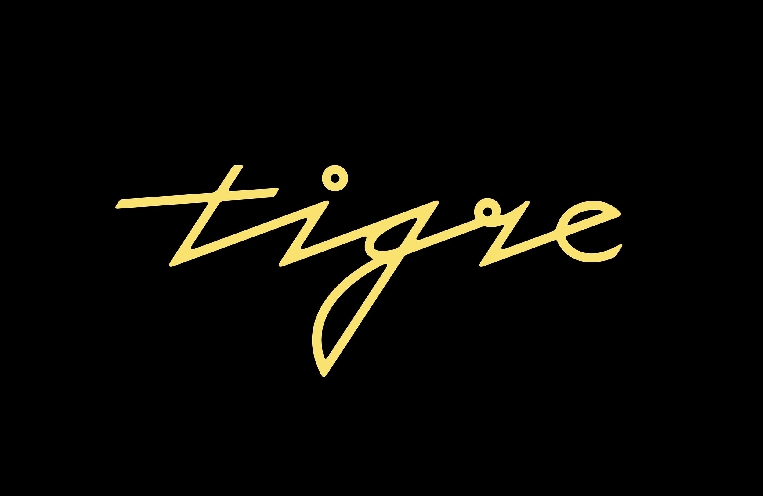 Cursive logotype, menu design, coaster and matchbooks for New York bar Tigre designed by Triboro. 