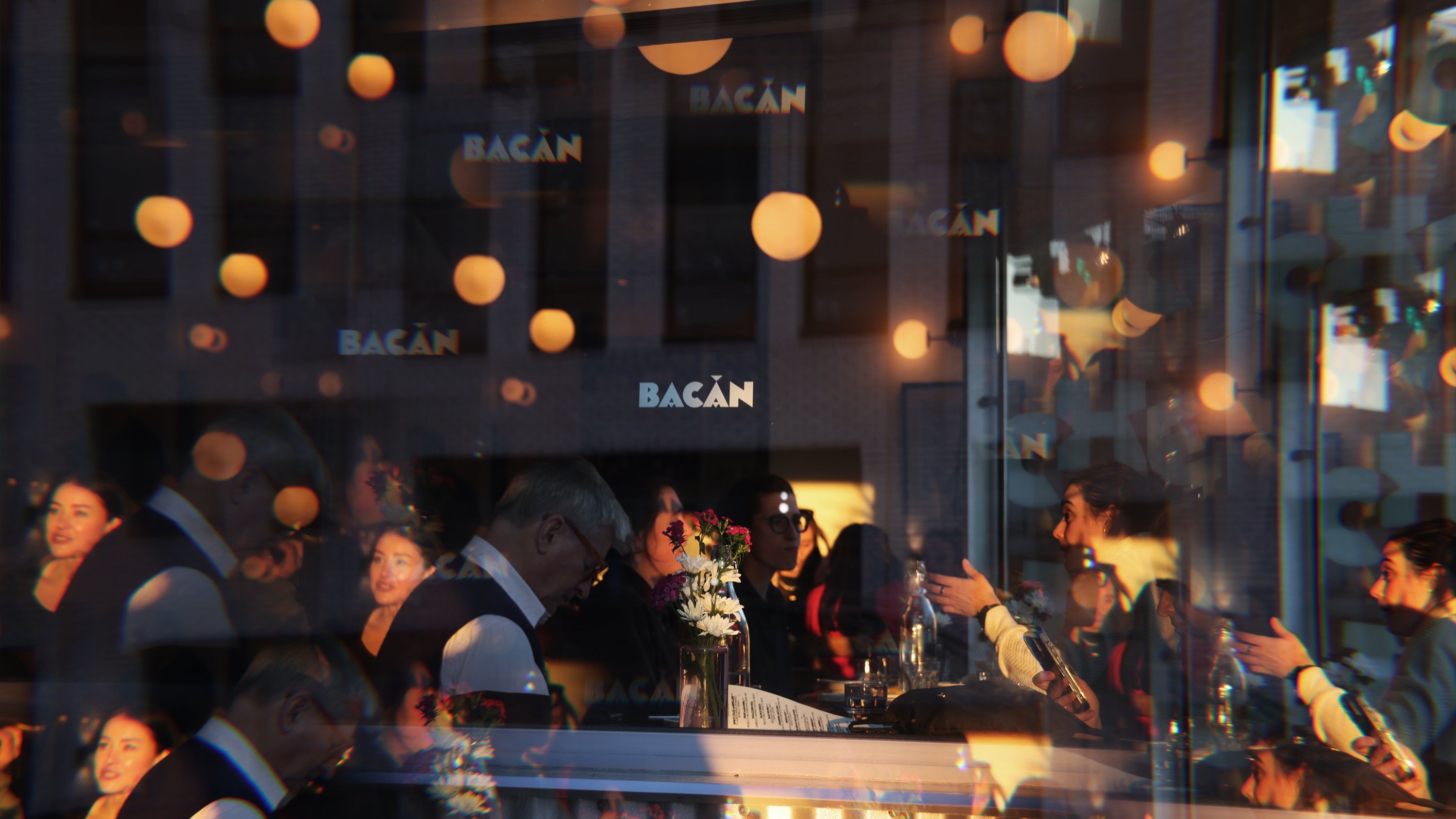 Variable typeface, illustration and motion graphics for Williamsburg-based Italian restaurant Bacàn designed by Pentagram