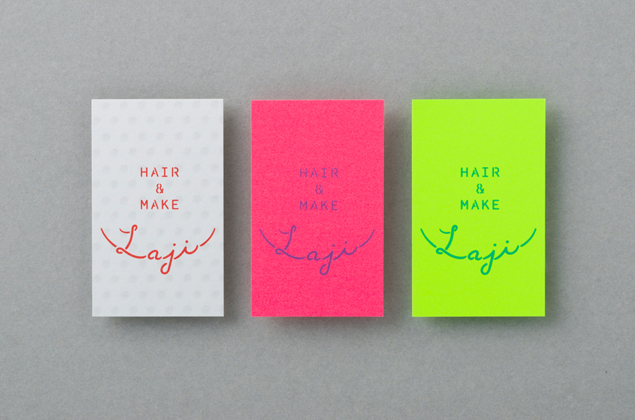 Laji Hair & Make logotype and neon paper business cards designed by UMA