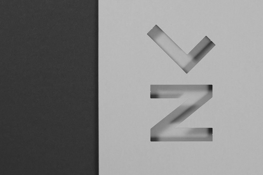 Monogram and die cut portfolio folder for architectural photographer Luka Žanić by Studio8585