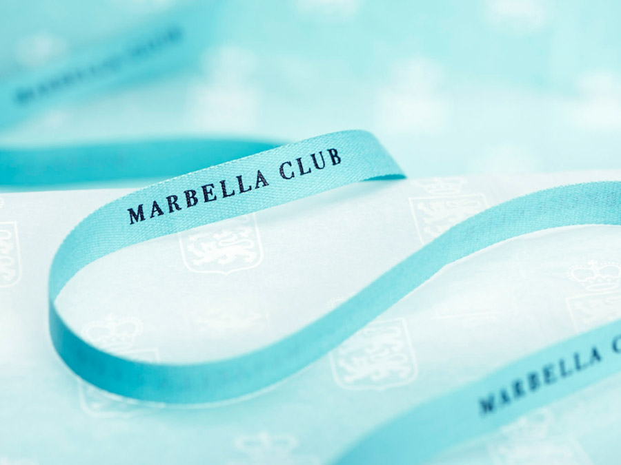 Branded ribbon designed by Pentagram for Spanish hotel, golf club and spa resort Marbella Club