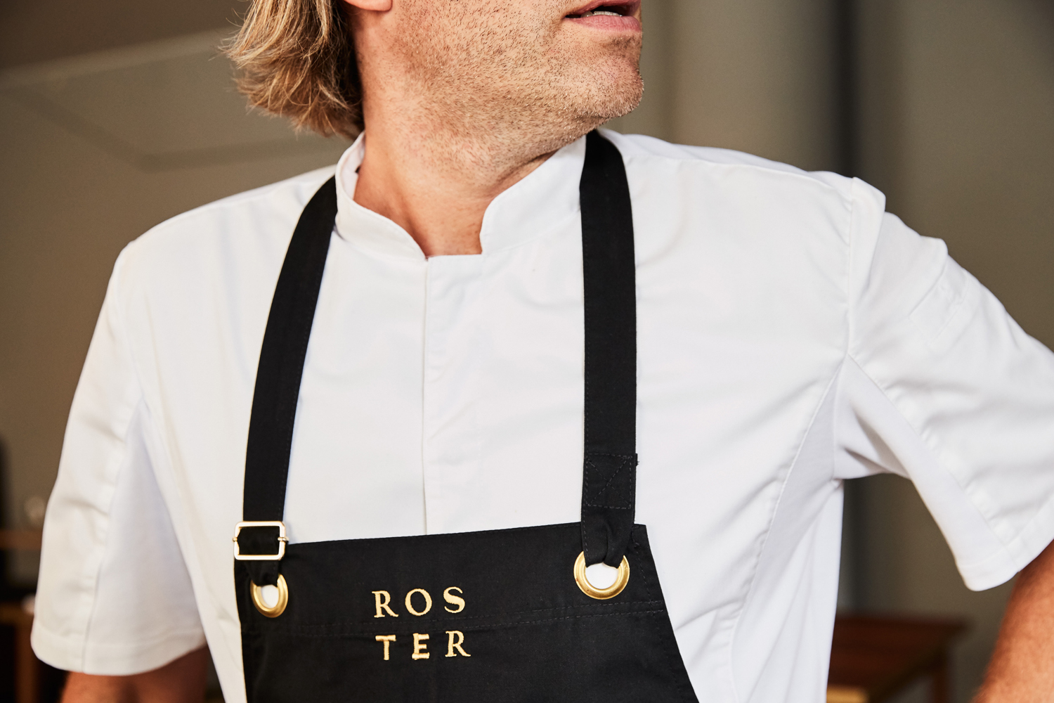 Logotype and branded apron by Bond for Helsinki bar and restaurant Roster