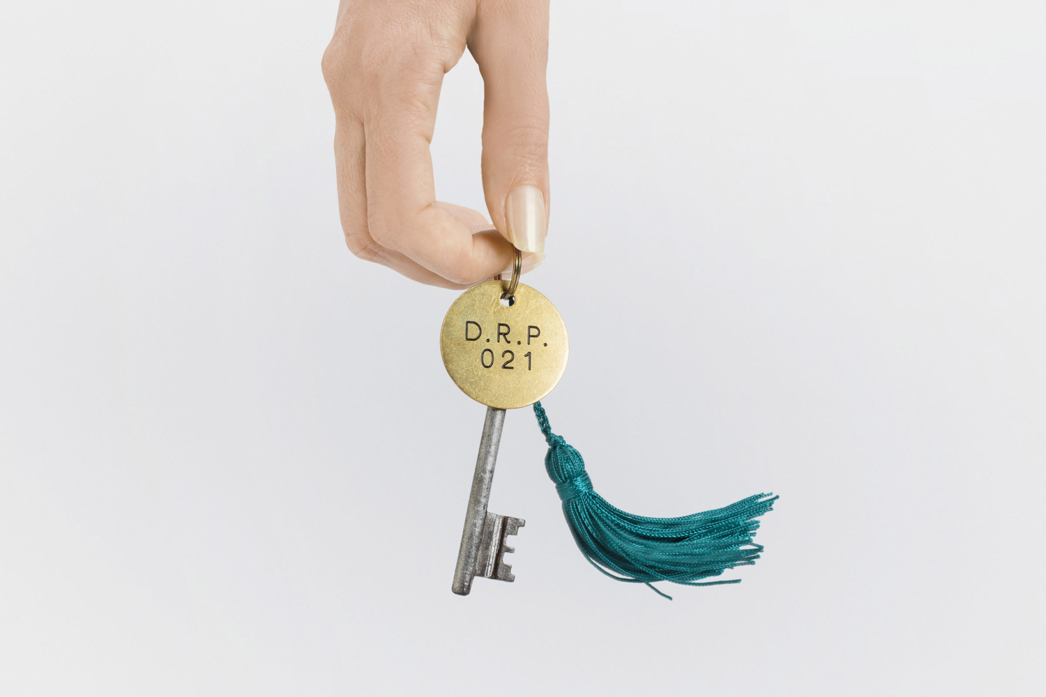 Brand identity and keychain designed by London-based studio Two Times Elliott for Soho members bar Disrepute