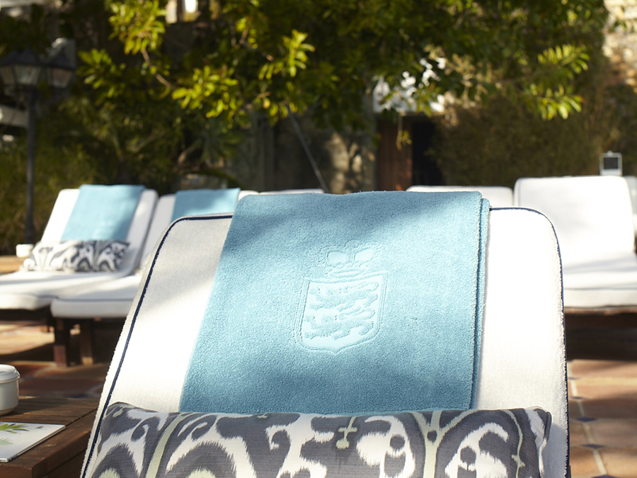 Branded towels designed by Pentagram for Spanish hotel, golf club and spa resort Marbella Club