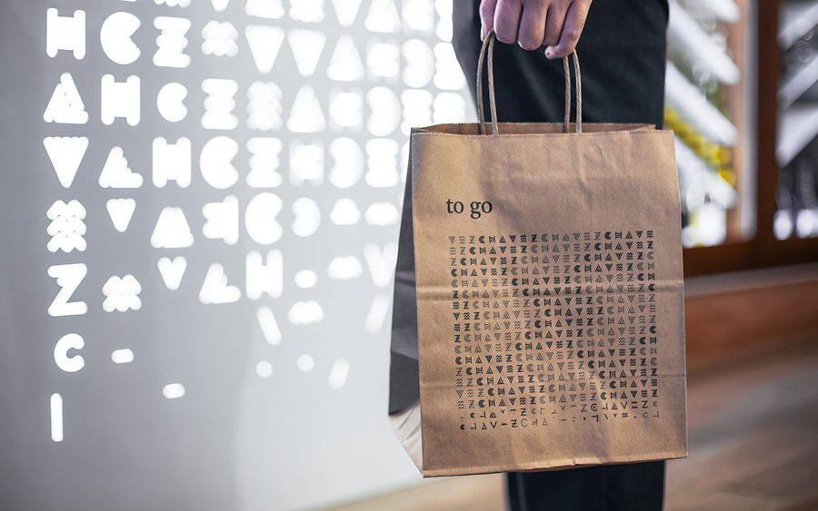 Iconography and takeaway bag designed by Föda for Shawn Cirkiel's Austin based Mexican restaurant Chavez.