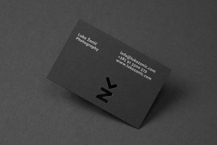 Business cards with silver ink and die cut detail by Studio8585 for architectural photographer Luka Žanić