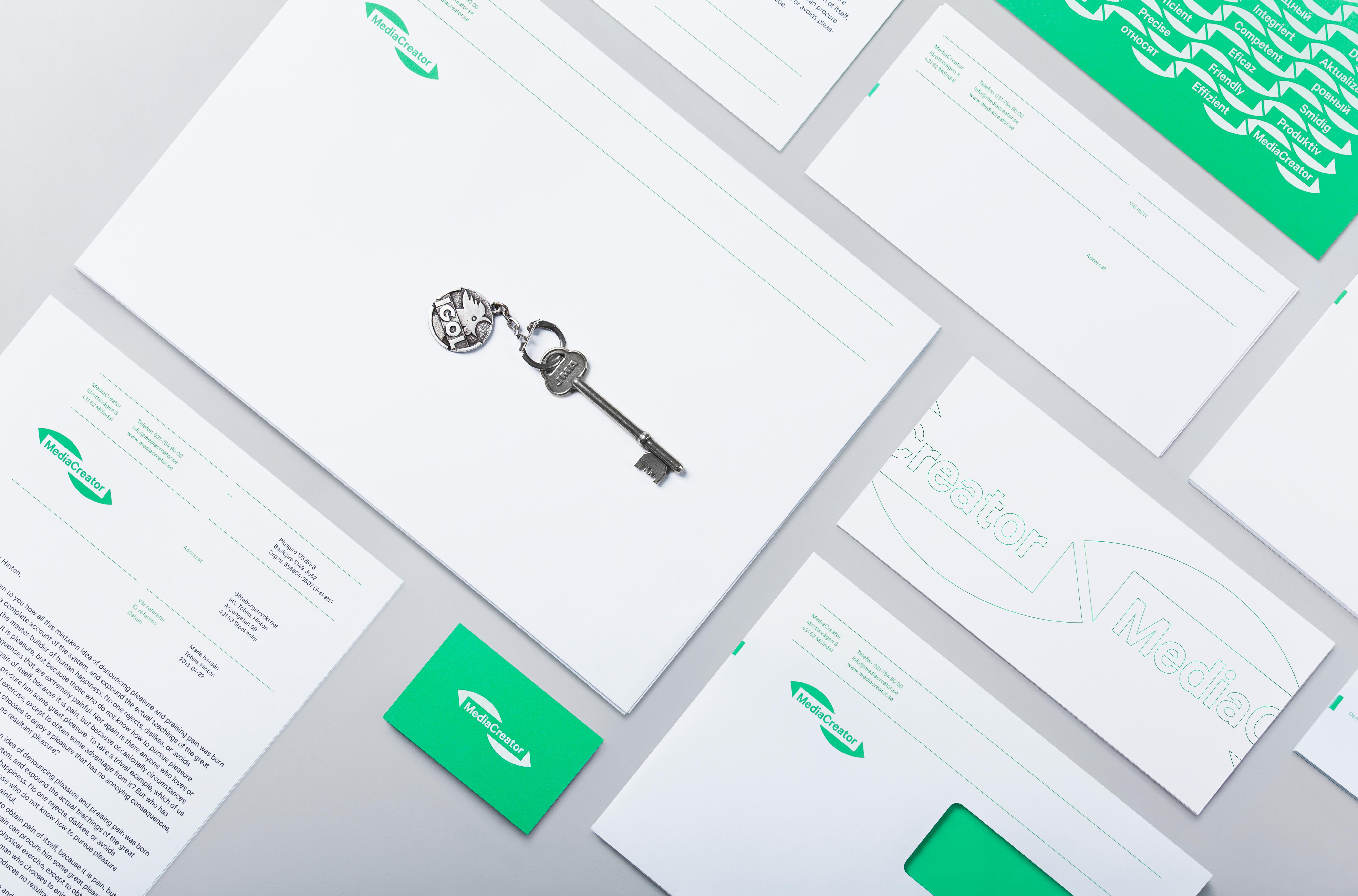 Logo and stationery with fluorescent green ink detail designed by Lundgren+Lindqvist for Swedish print production and project management company MediaCreator