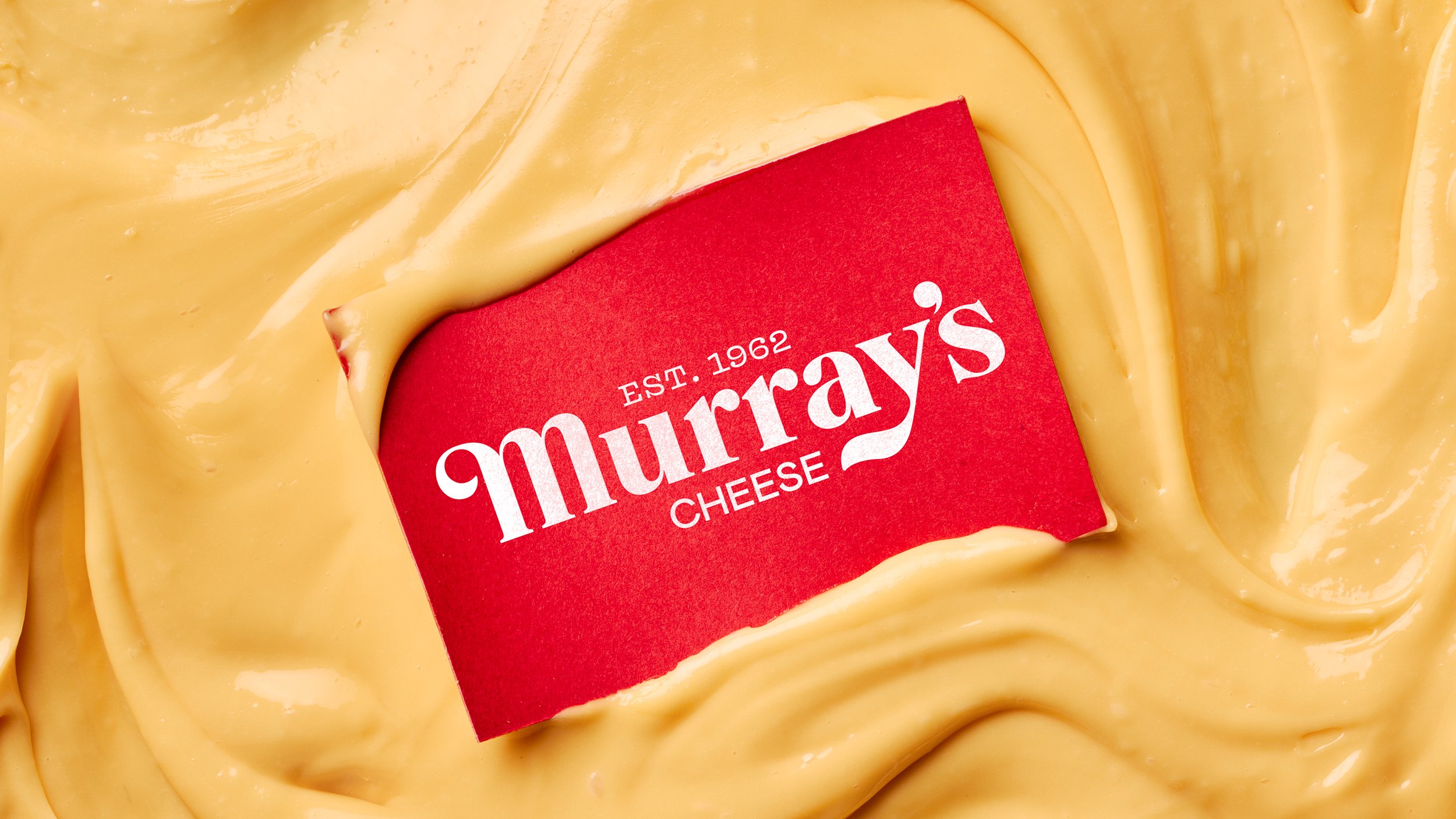 New logo-type, illustration and packaging design for Murray's Cheese created by Base Design