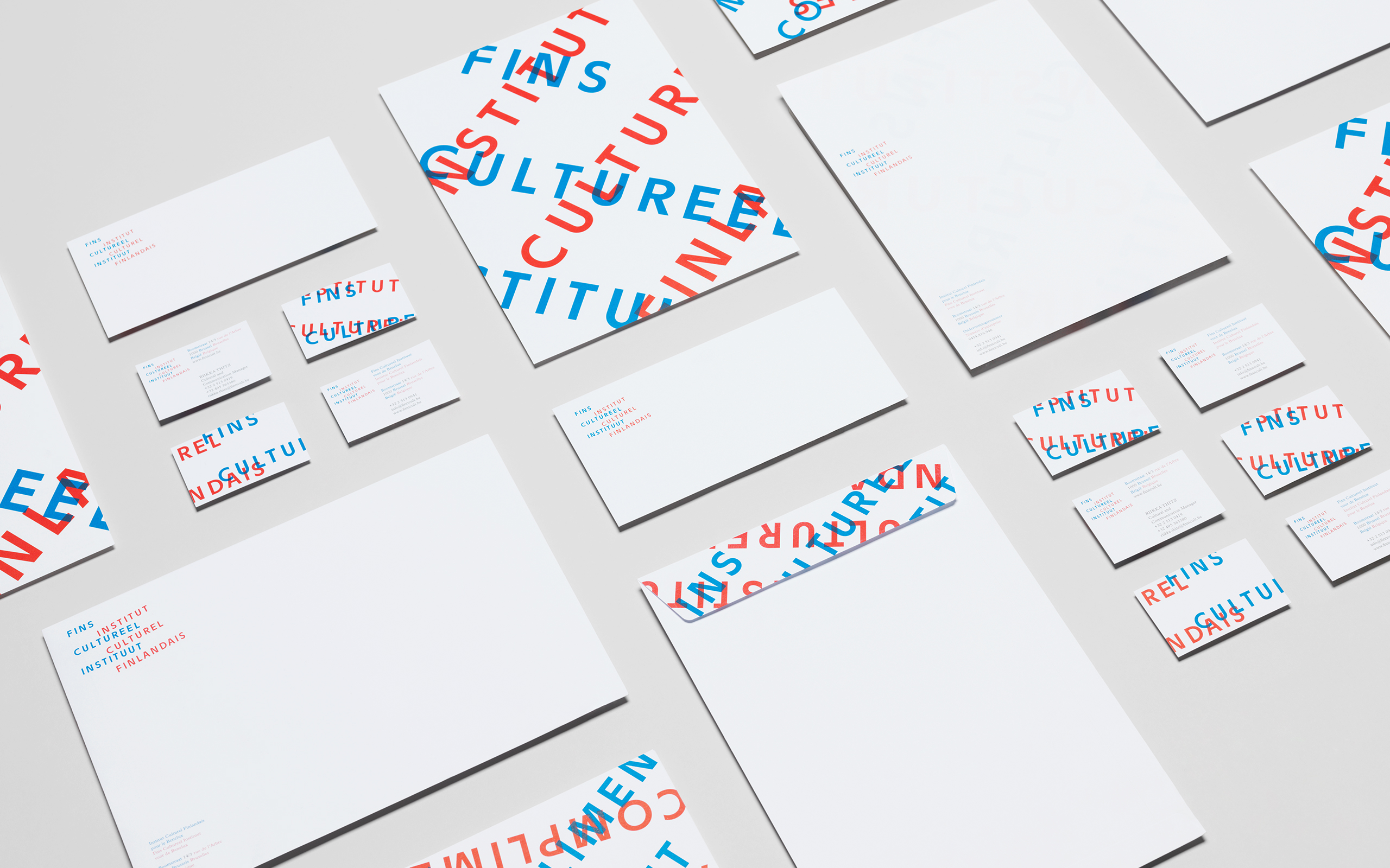 New logo and stationery with red and blue ink overprint detail designed by Kokoro & Moi for The Finnish Cultural Institute for the Benelux