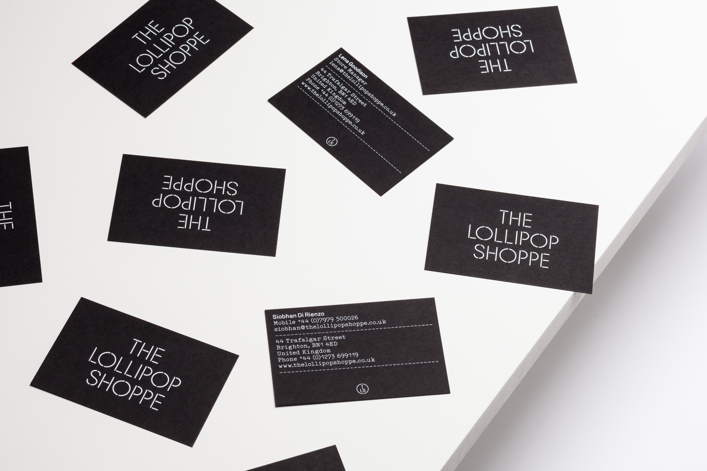 Logo and business cards with white foil detail created by Studio Makgill for designer furniture and accessories retailer The Lollipop Shoppe