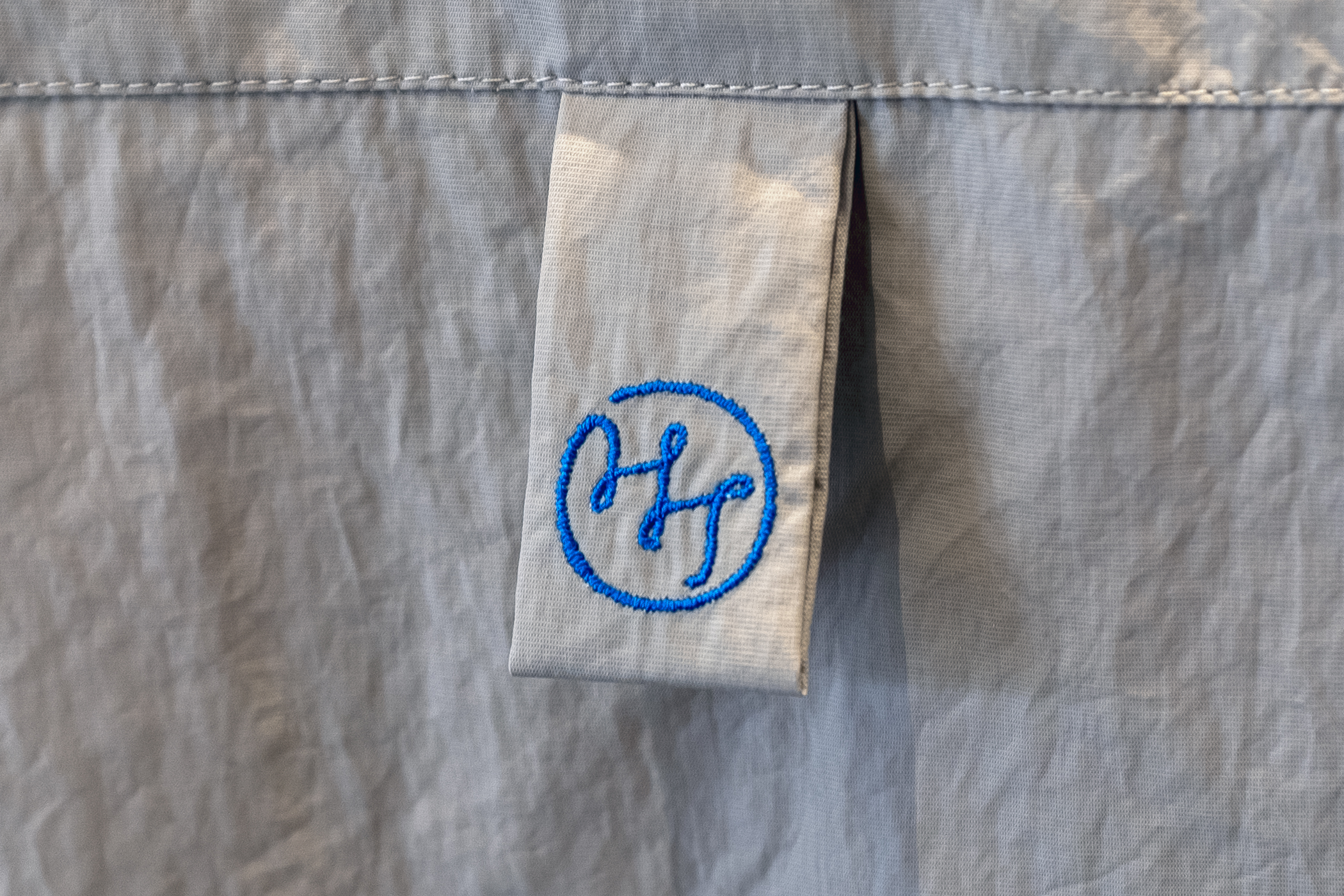 Logo and embroidered uniform by Studio fnt for Korean paper brand Hanji