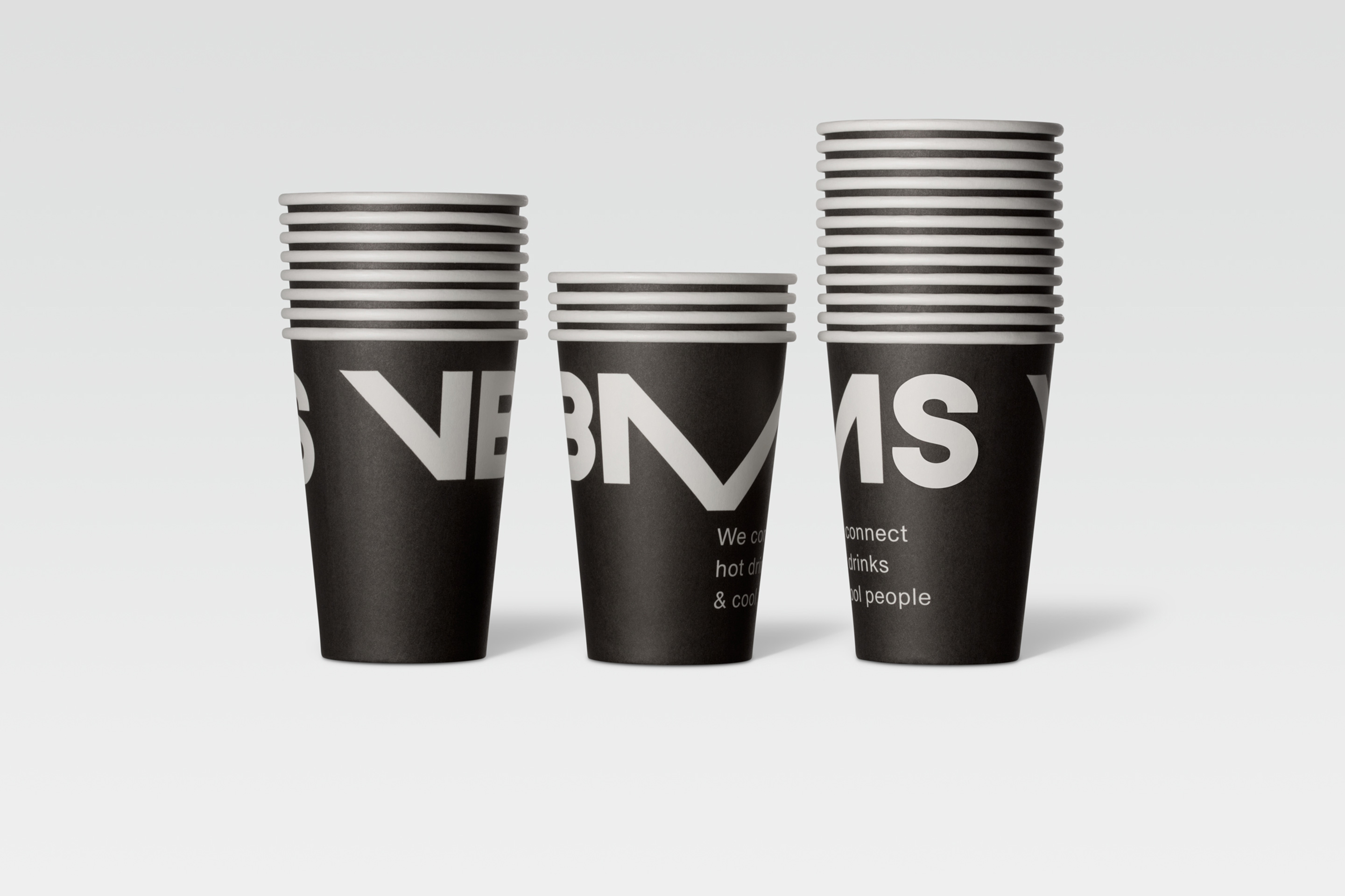 Logotype and branded coffee cups by Studio Dumbar for VBMS