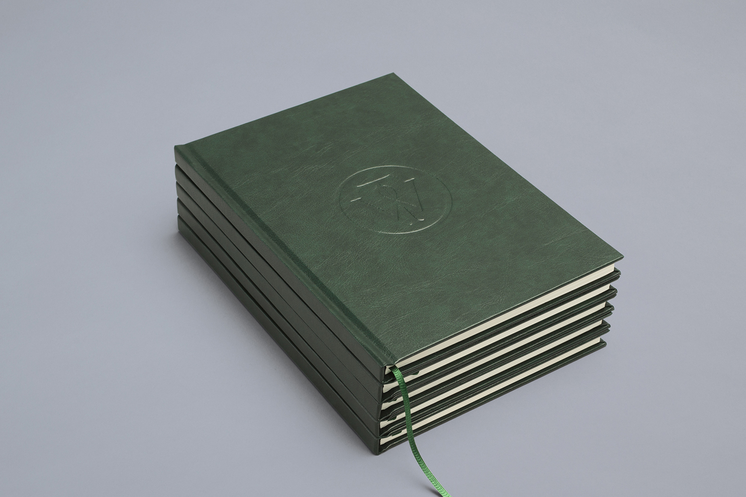 Notepad with embossed green leather cover designed by Bunch for business consultancy Willow Tree 