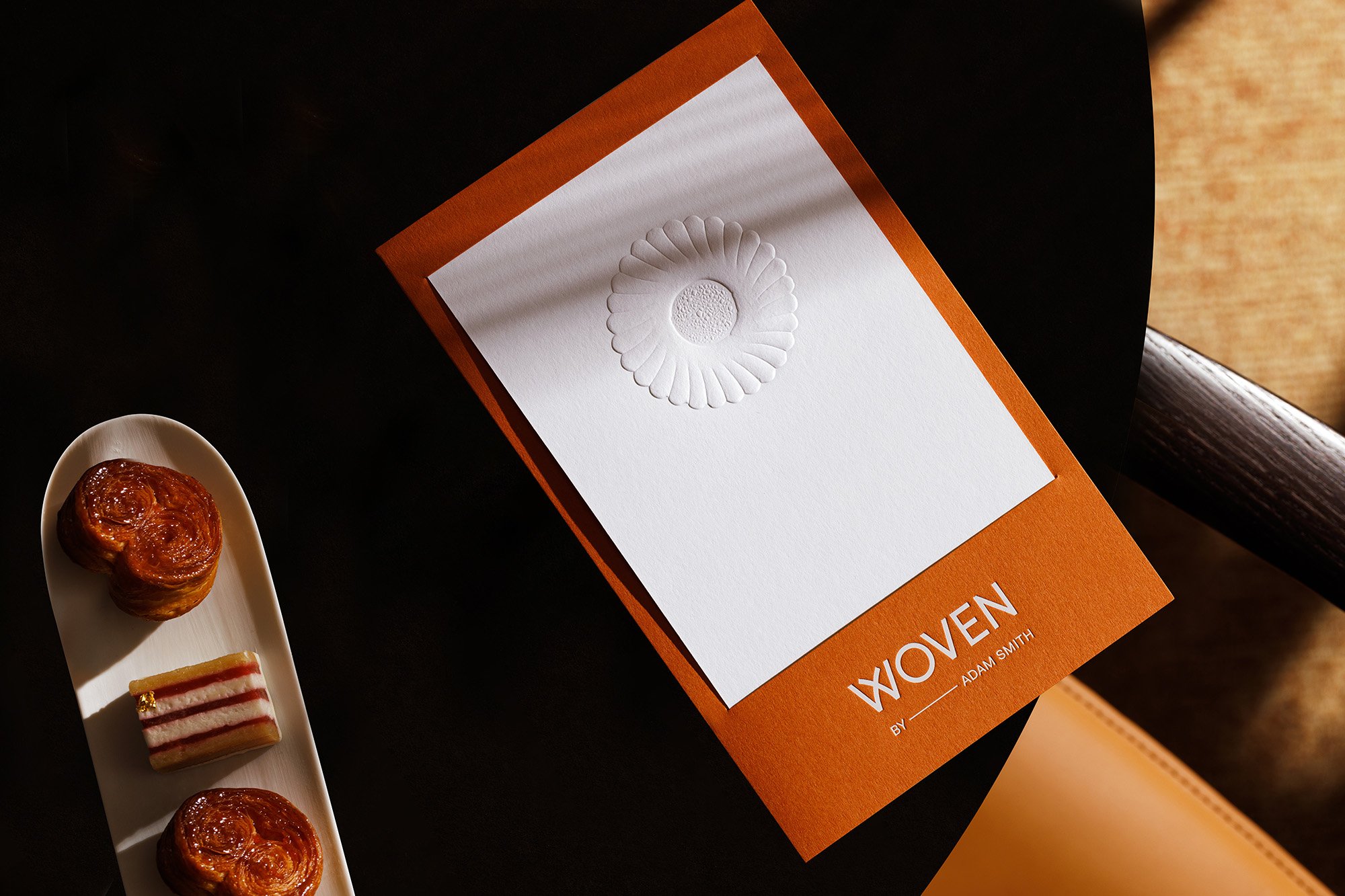 Logotype, signage and menu design for Woven, a Michelin star restaurant owned by the Dorchester Collection