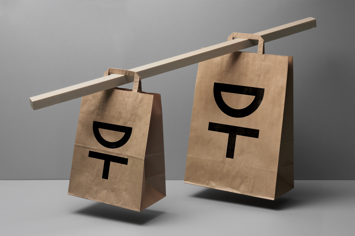Logo and unbleached carrier bag by Kurppa Hosk for Swedish contemporary furniture, art and design curator and retailer Designtorget