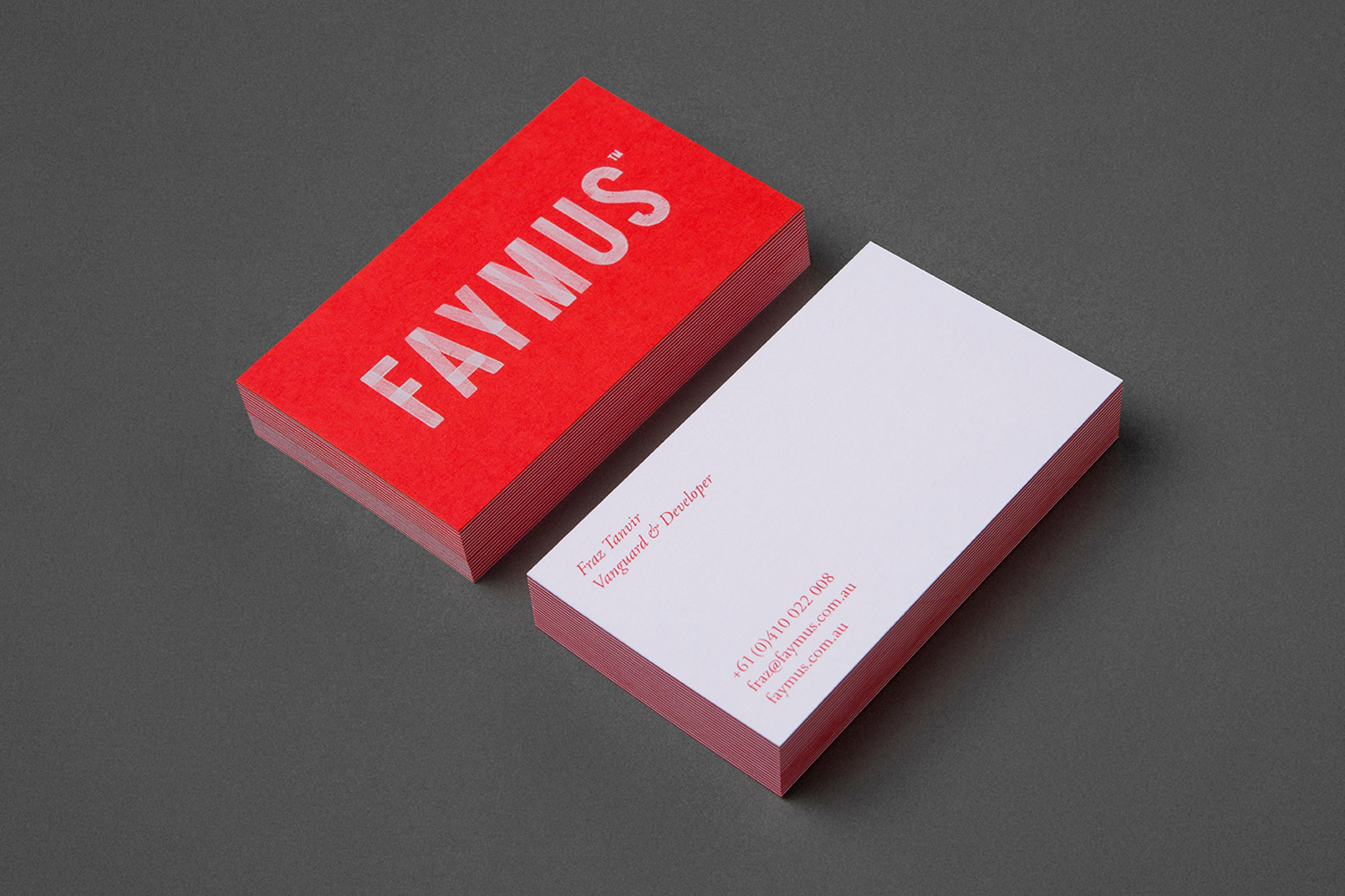 White ink and duplex business card for Faymus designed by Studio Brave