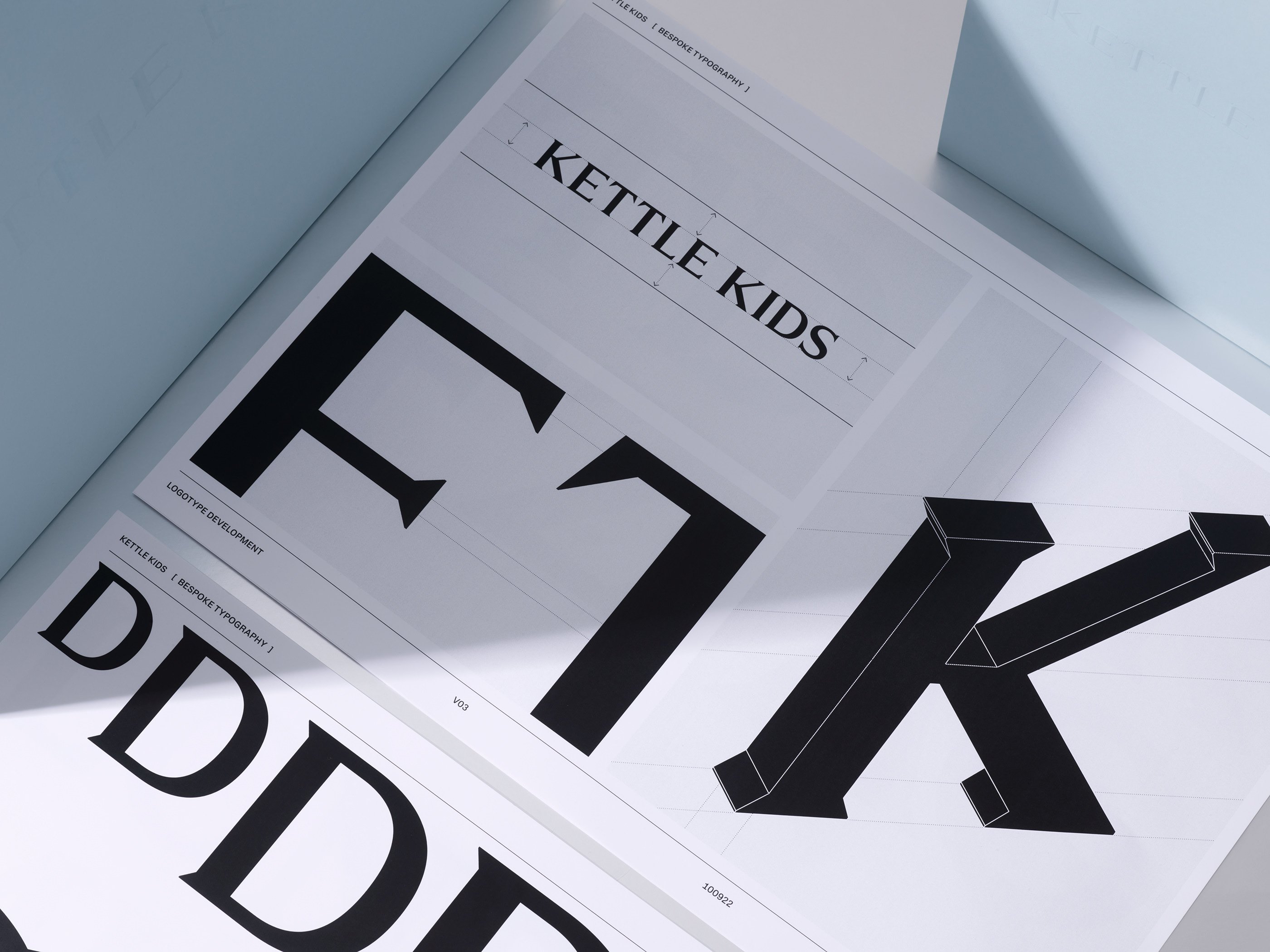 Monogram, logotype and custom typeface for London luxury watch retailer Kettle Kids designed by Two Time Elliott