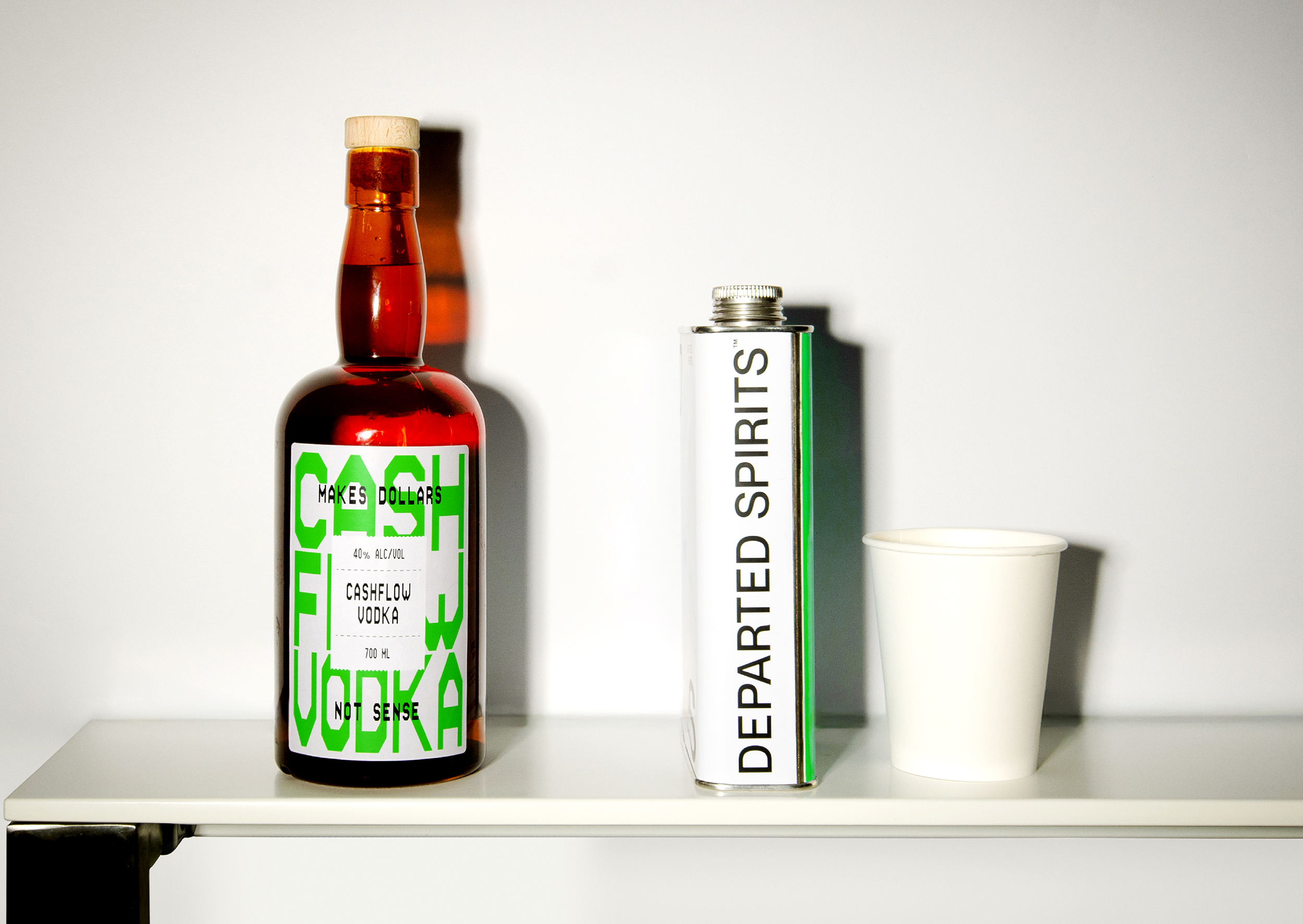 Logotype, labels and posters for Cashflow Vodka from Departed Spirits designed by New Zealnd based Marx