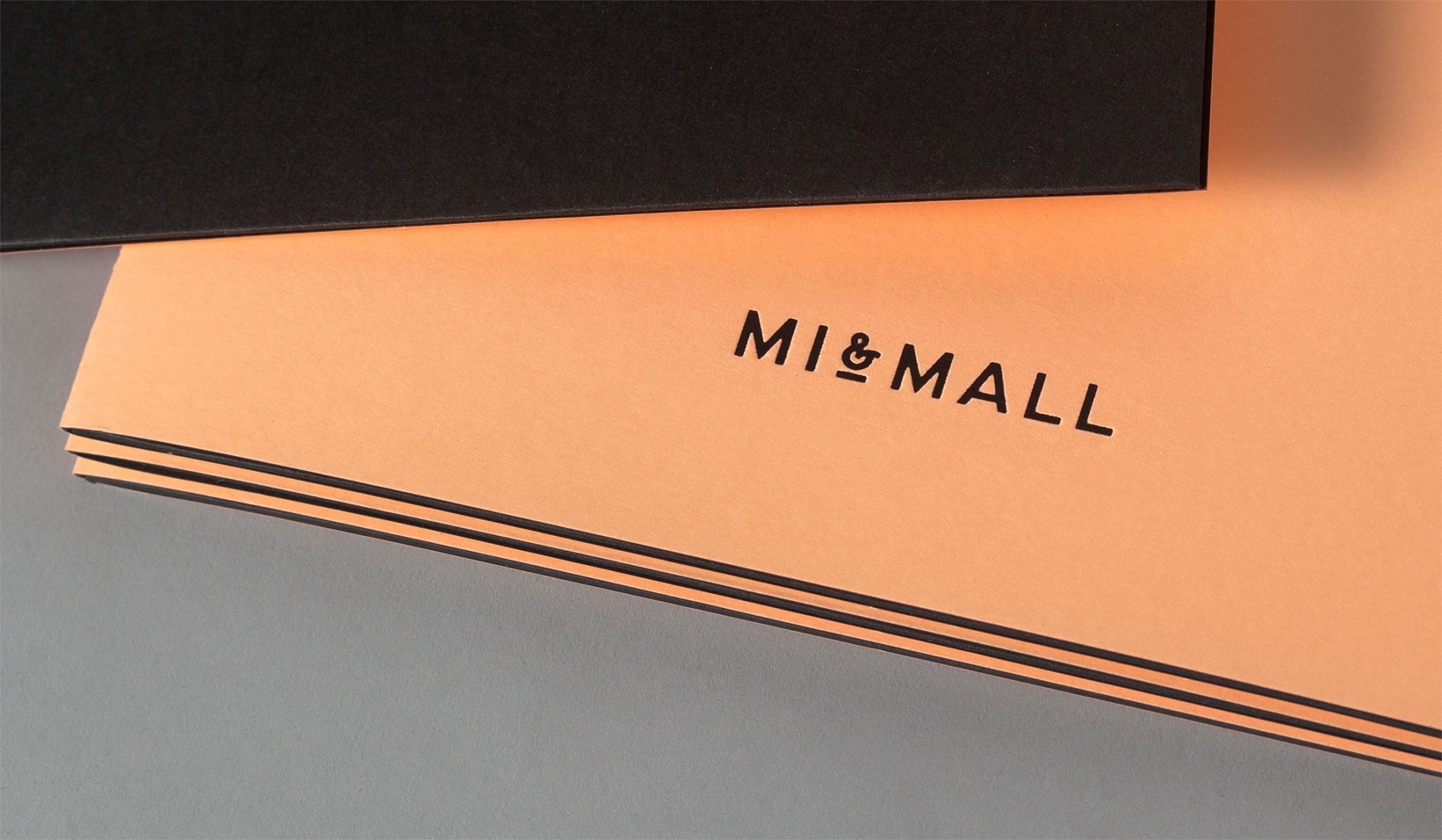 Logo and letterpress folder designed by Atipo for online fashion retailer Mi&Mall