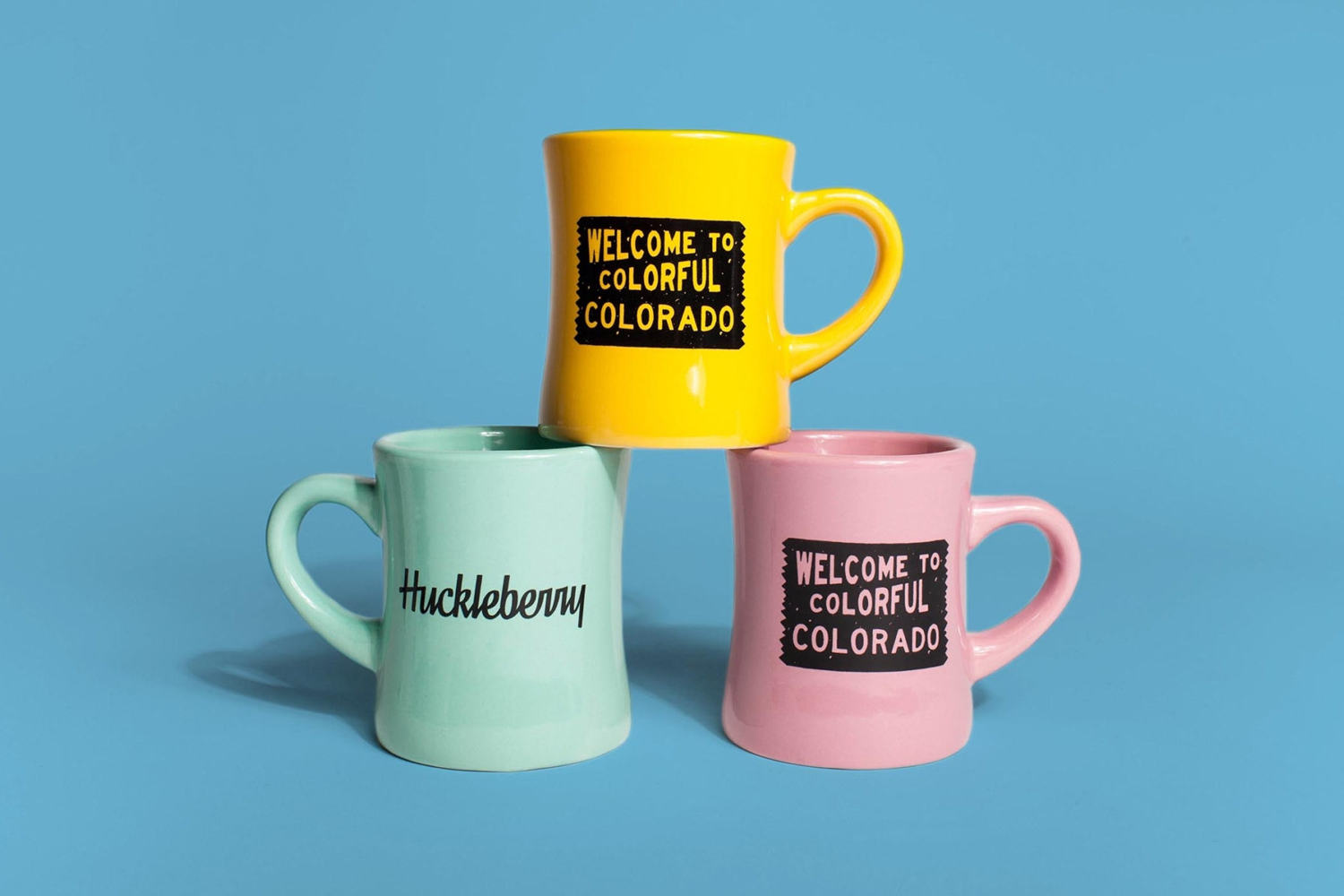 Branded mugs for Colorado coffee roaster Huckleberry by Mast