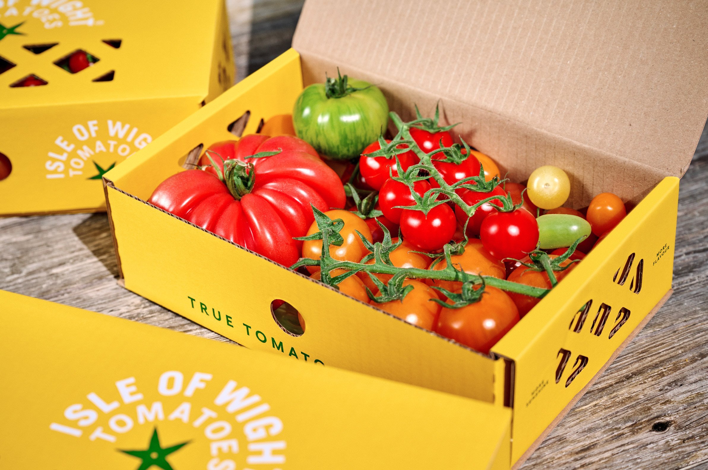 Logo, branding and packaging design by London-based B&B Studio for Isle of Wight Tomatoes. 