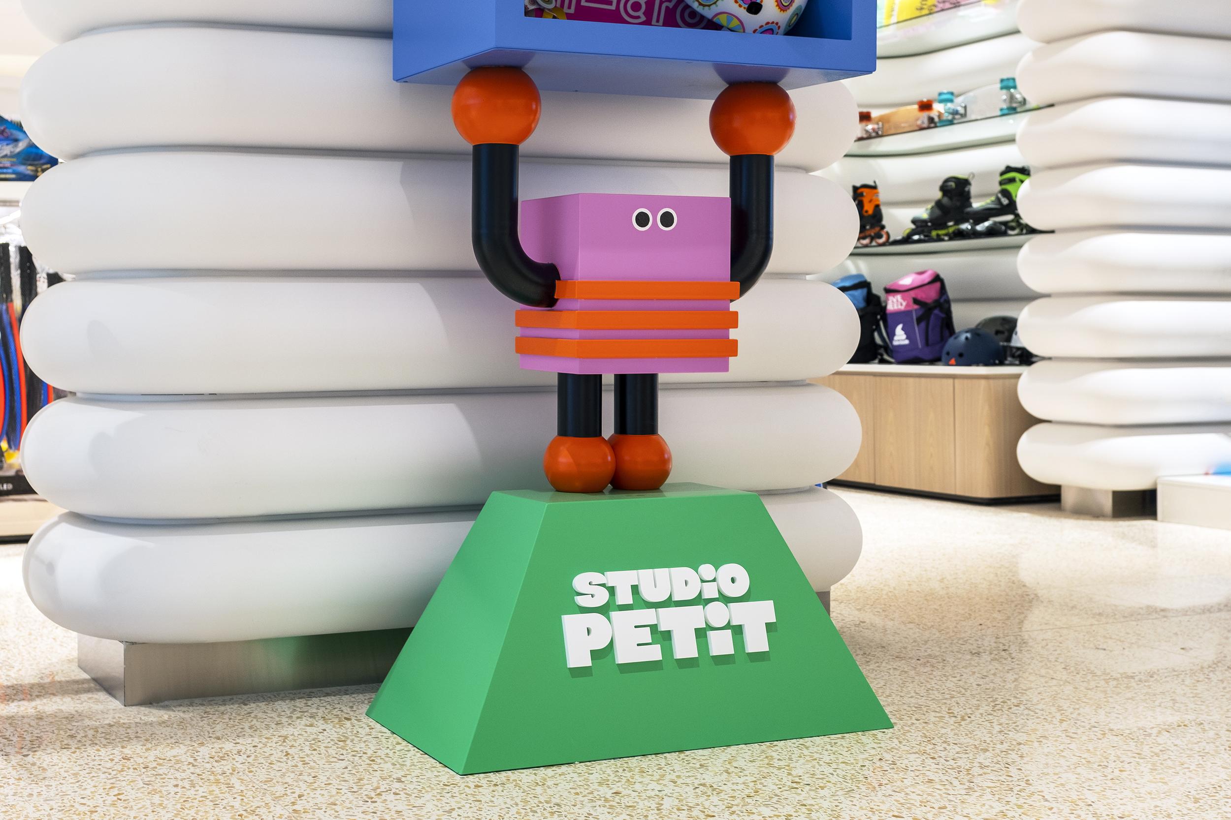 Brand identity, interior design and signage designed by Studio fnt for toy department Petit Planet at South Korean department store Hyundai