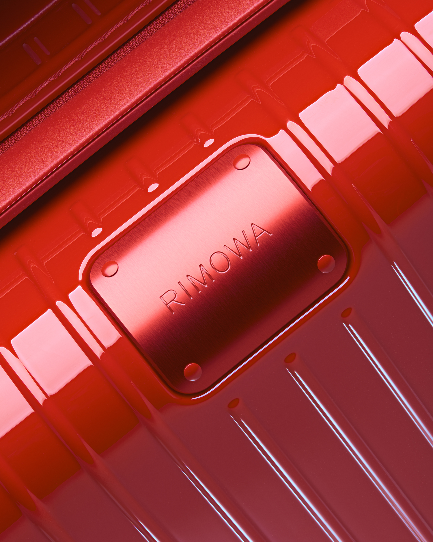 Logotype and art direction by Commission studio for functional luxury luggage manufacturer Rimowa