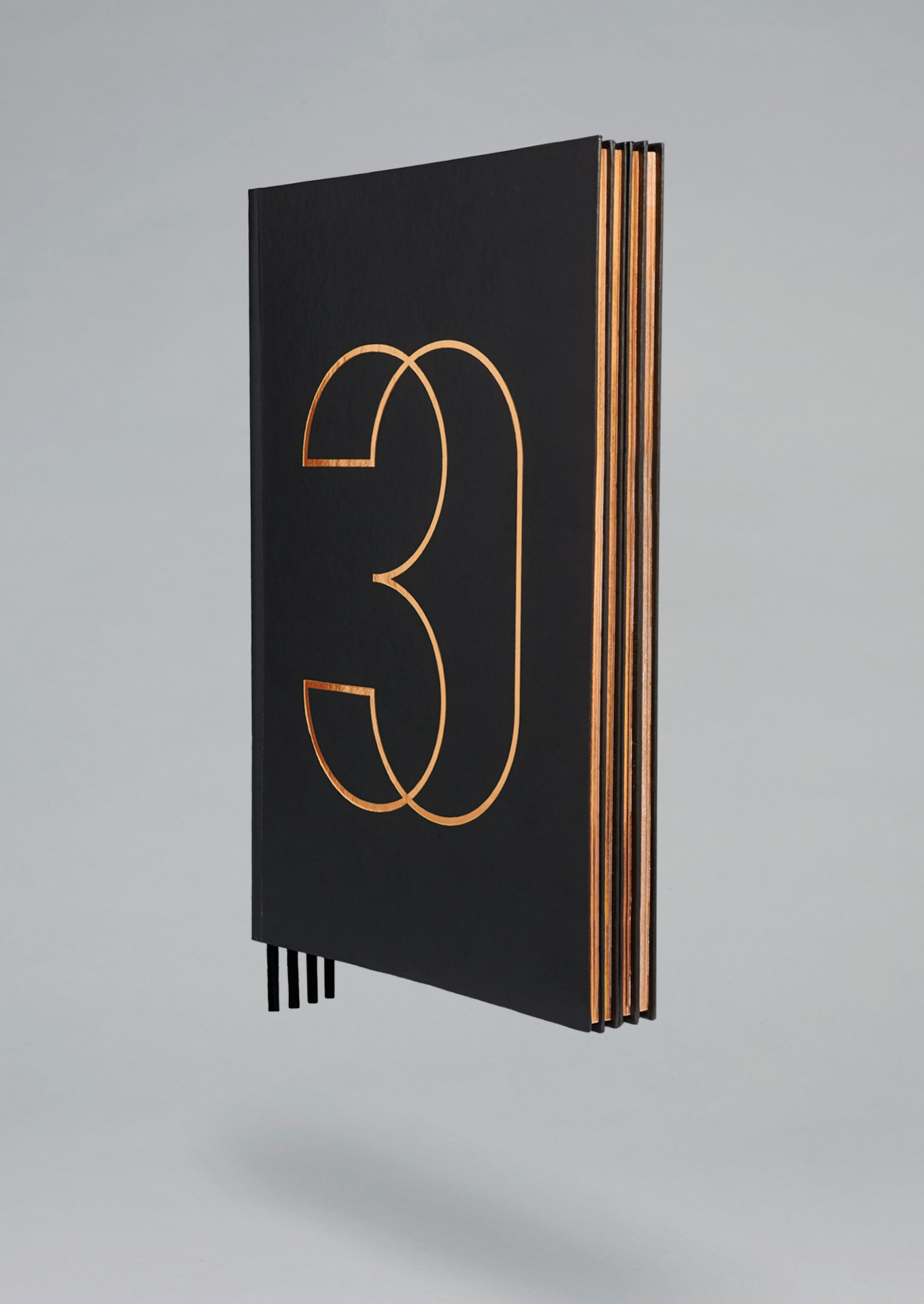 Copper foiled brochure for Four Seasons private residence 30 Park Place by Mother