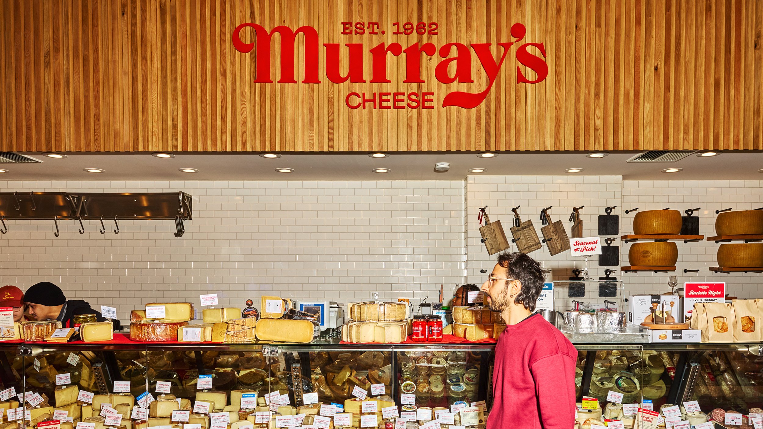 New logo-type, illustration and packaging design for Murray's Cheese created by Base Design