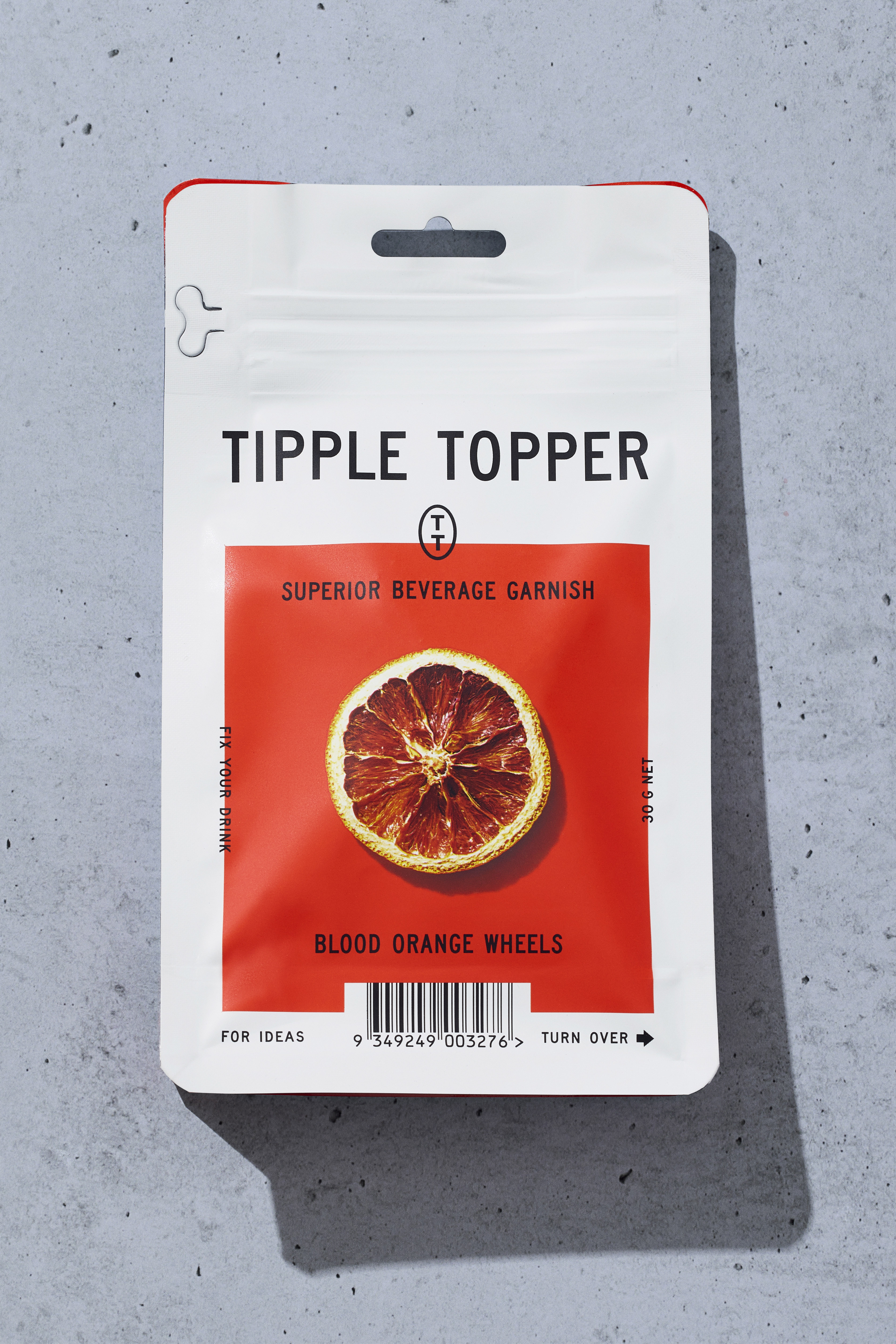 Identitas merek, desain kemasan, dan arahan seni oleh Desain Marx untuk merek hiasan koktail Australia Tipple Topper