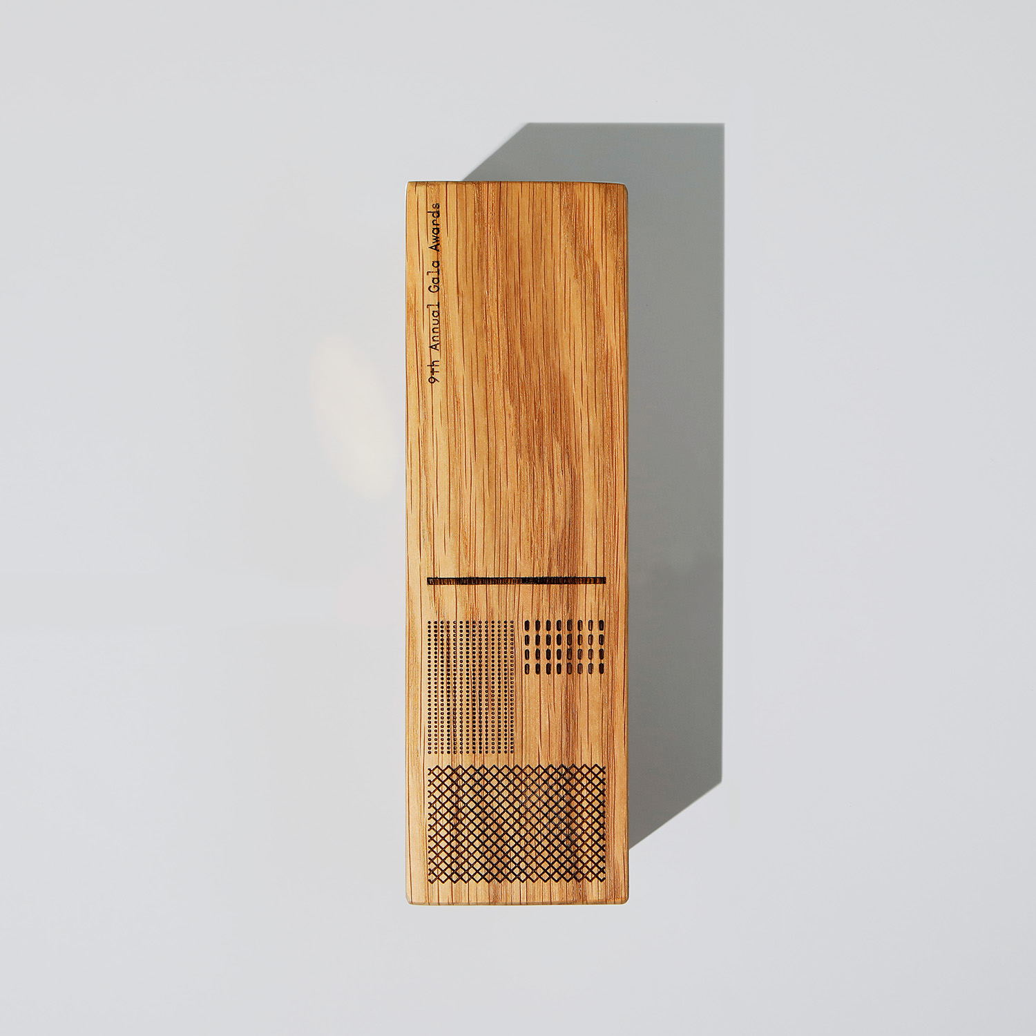 Wood trophy design for Career Trackers by Garbett