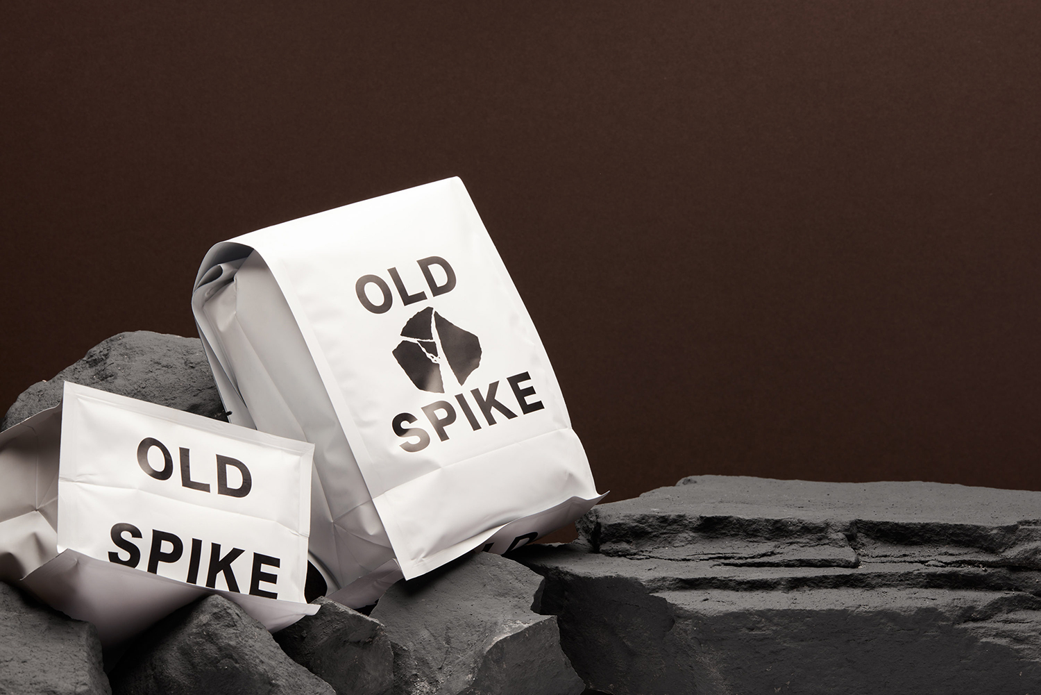 Logo and branded wholesale coffee bags designed by Commission Studio for London-based coffee roaster Old Spike