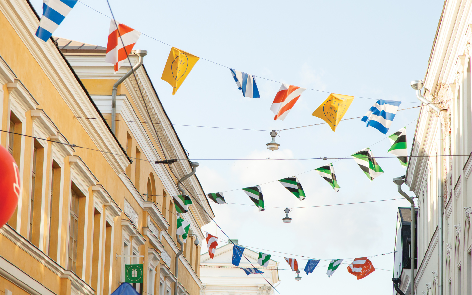 Logo, flags and patterns for Torikorttelit, the old town district of Helsinki, designed by KokoroMoi