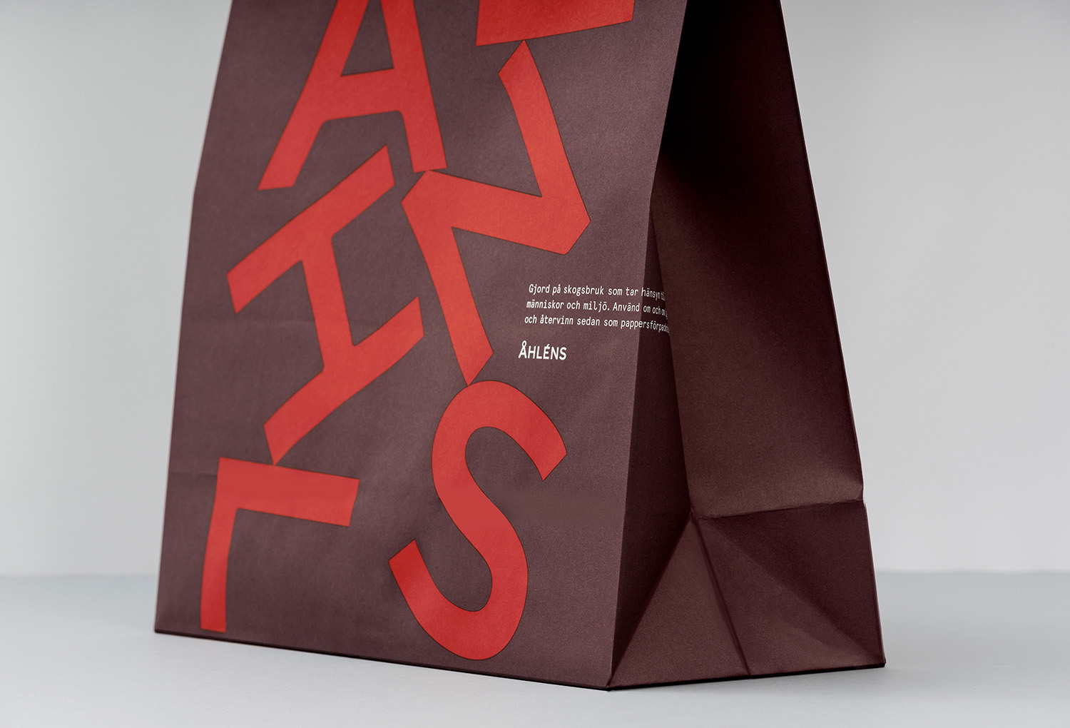 Visual identity and shopping bag by Happy FB for Swedish retailer Åhléns