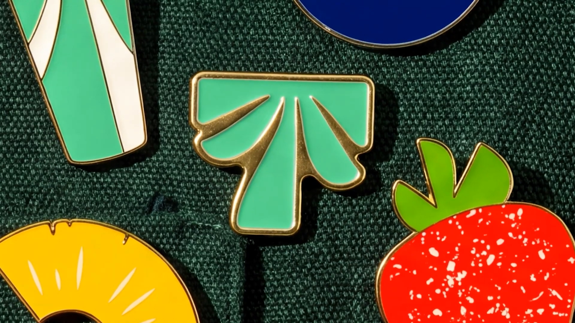 JKR Tropical Smoothie Cafe brand identity design BPO review pin badge