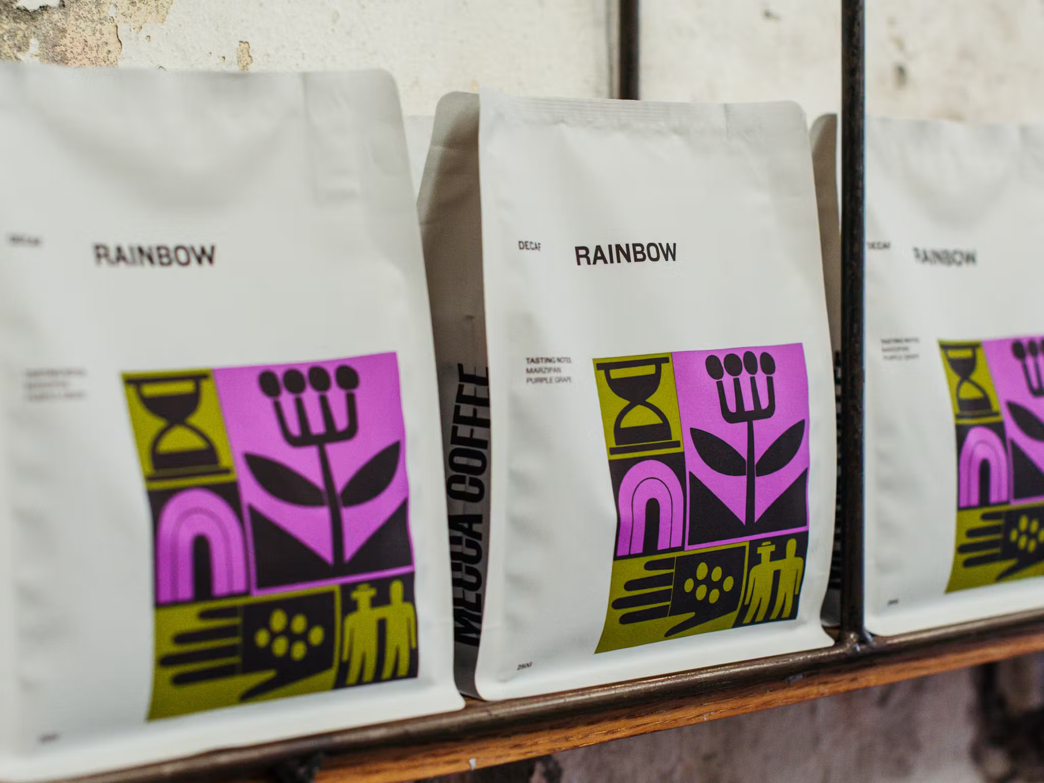 christopher doyle mecca coffee branding design identity bpo review packaging rainbow